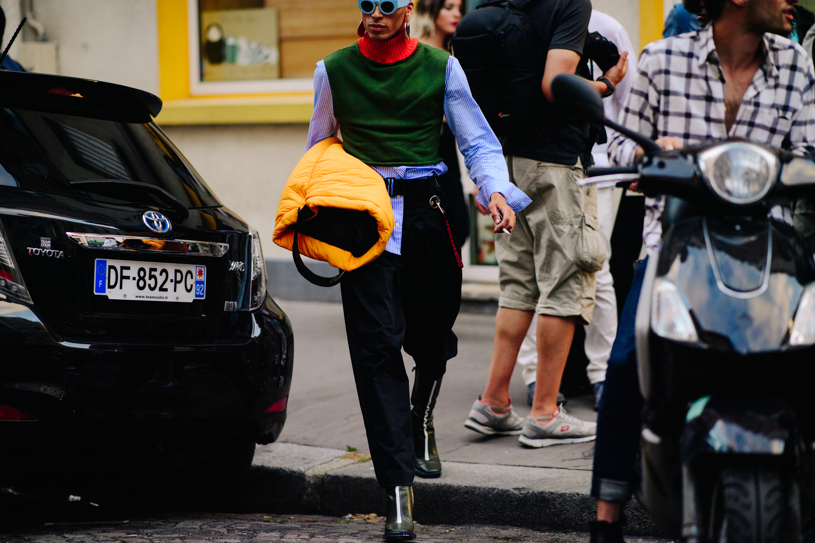 Designer wearing a wool turtleneck
