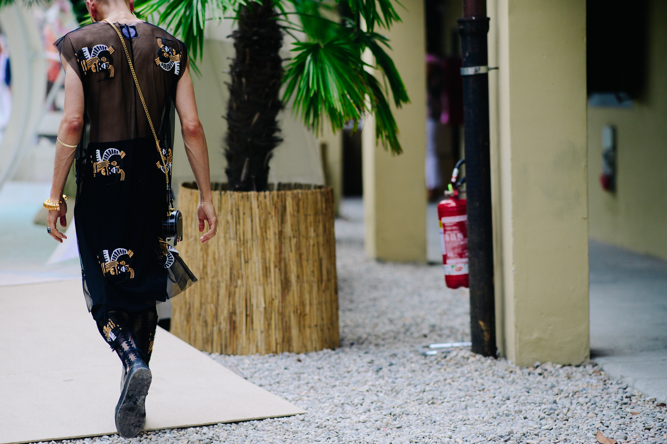 Designer wearing a long dress