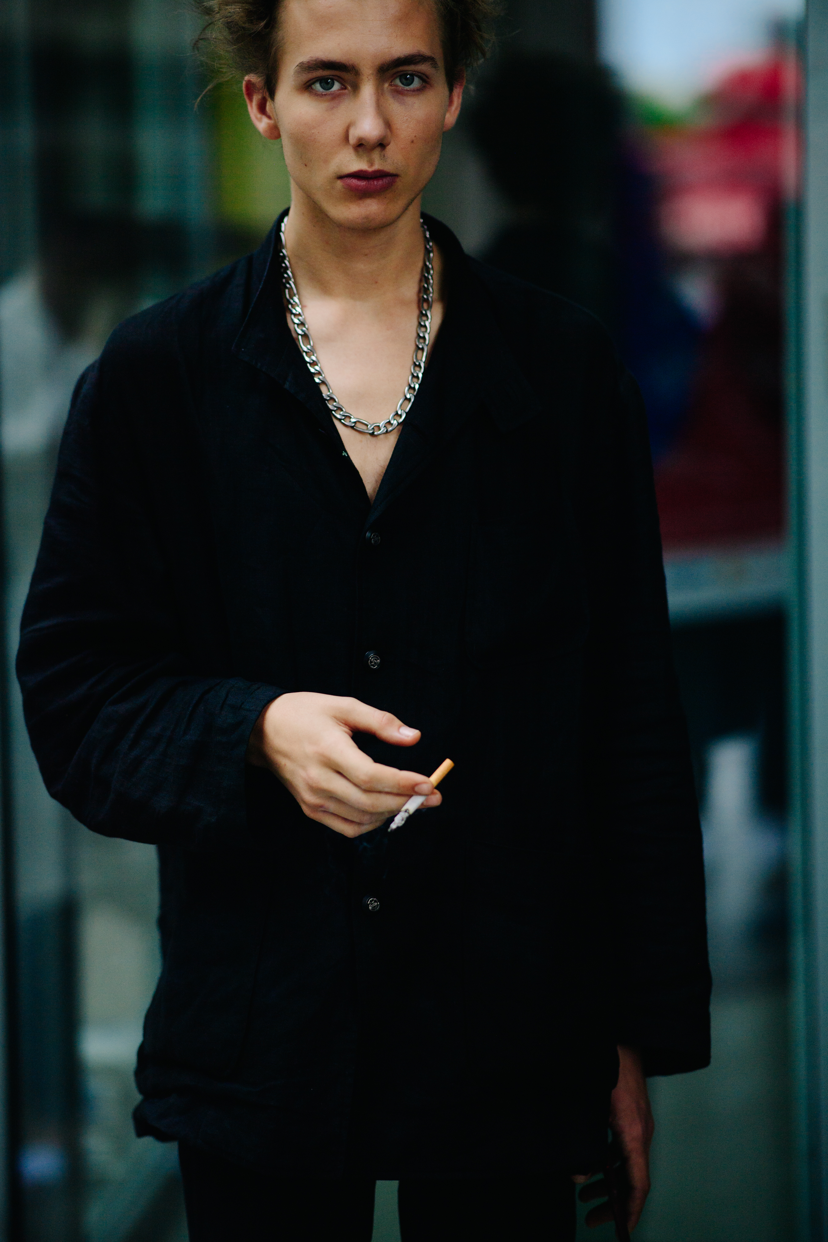 Model posing outside a venue