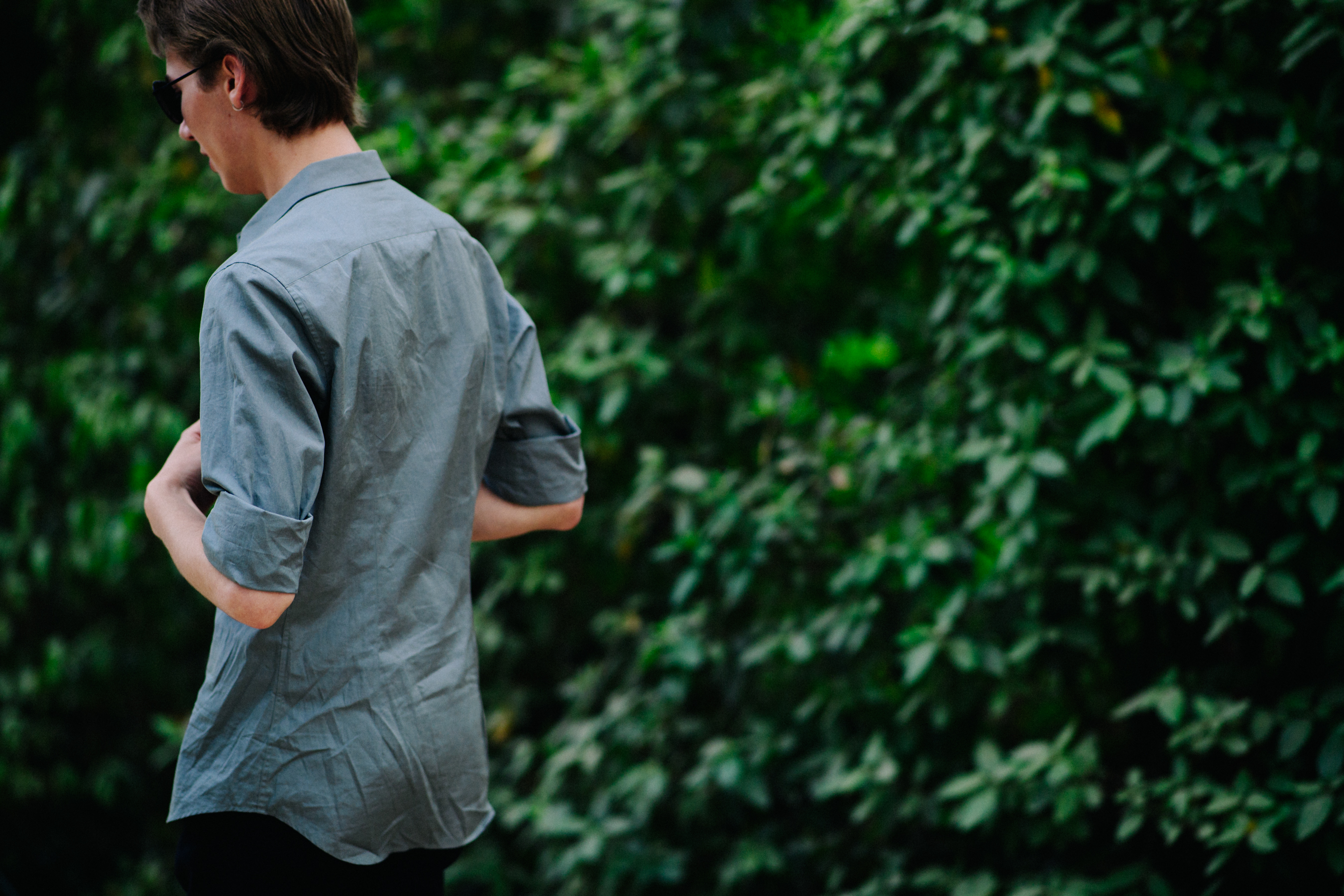 Male model wearing grey shirt