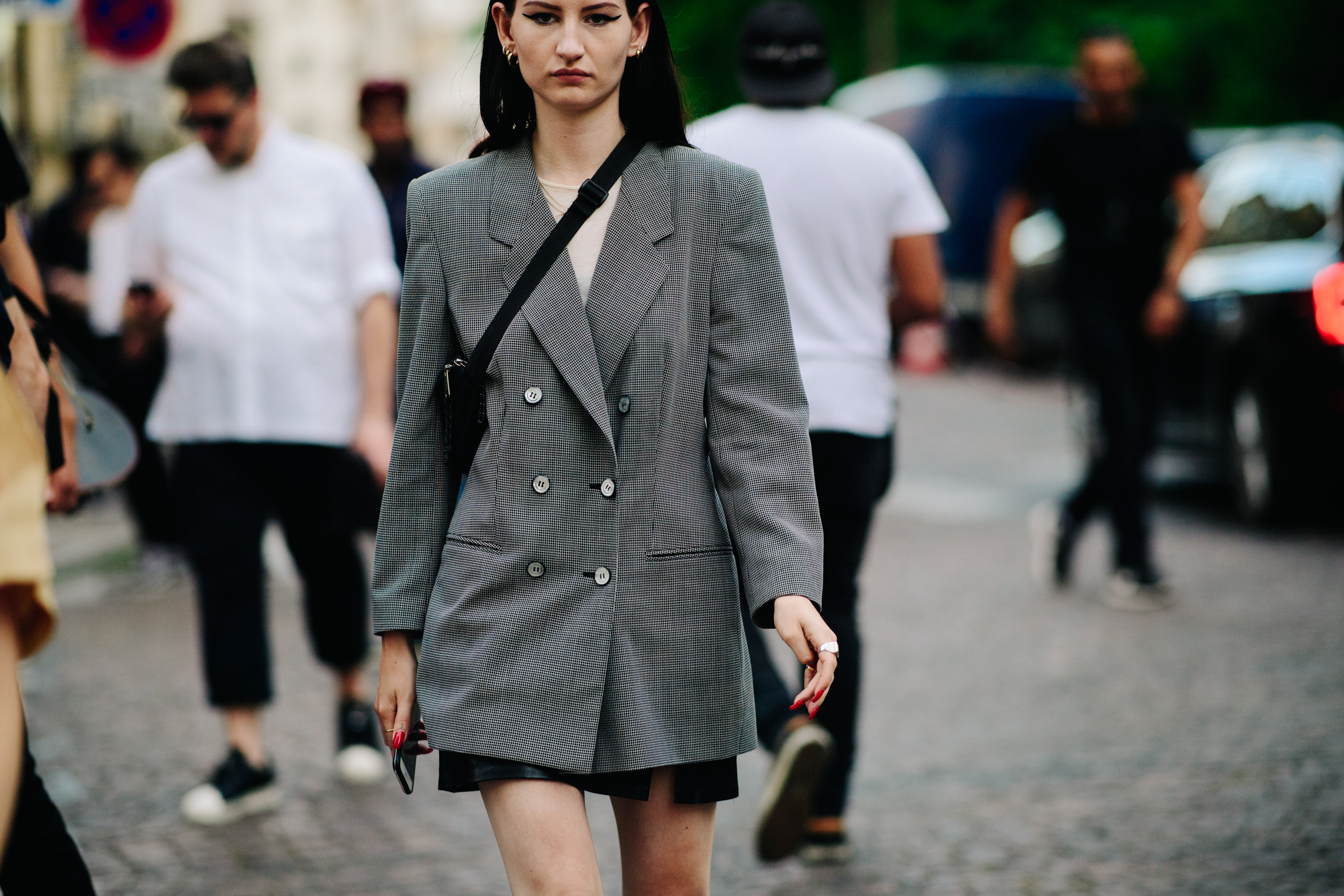 Stylist wearing a grey jacket