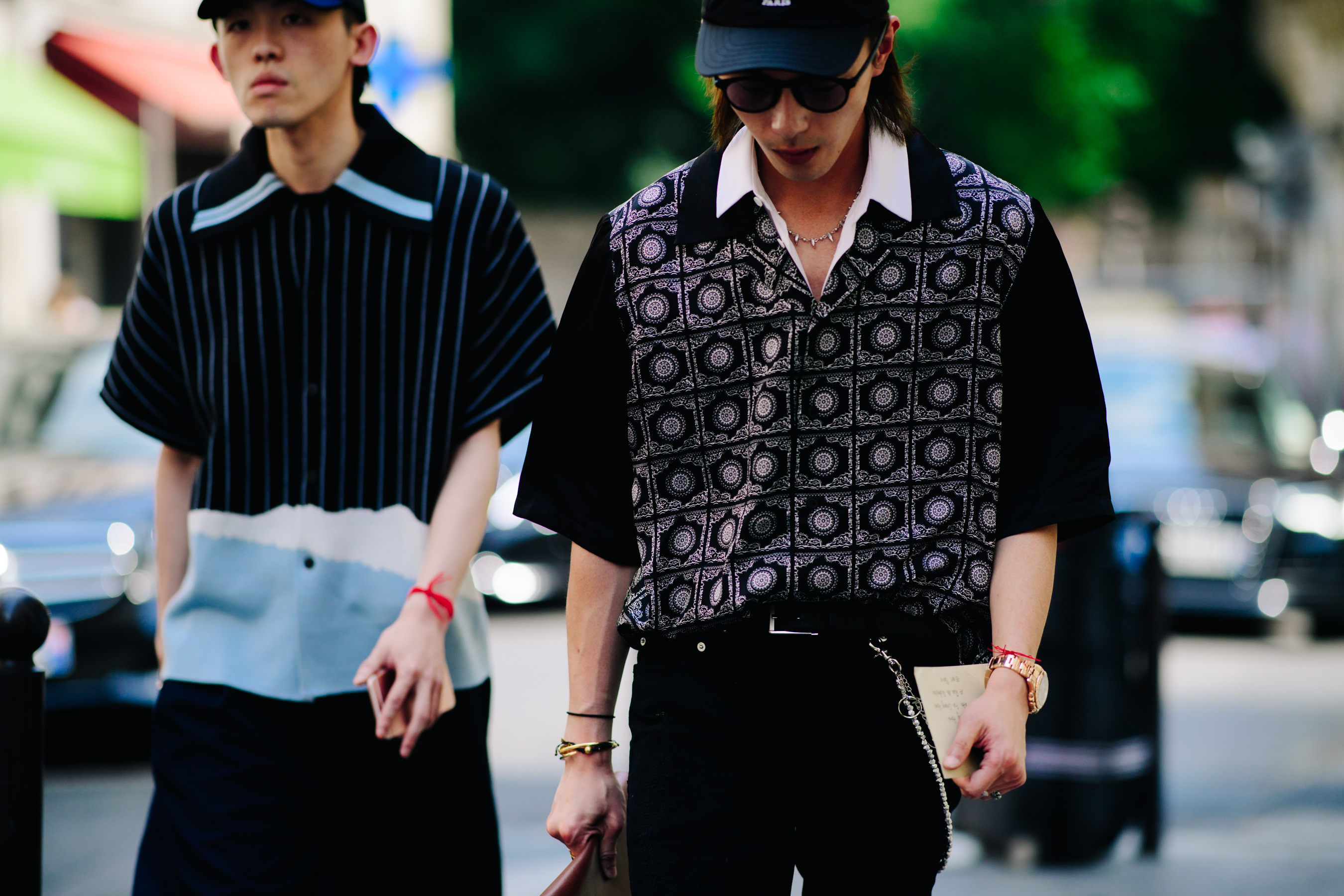 Two Asian boys wearing shirts