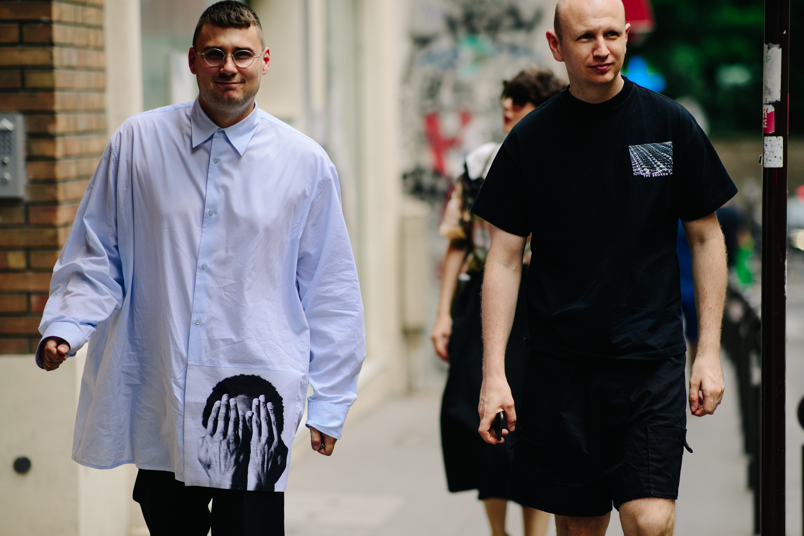 Man wearing a Raf Simons oversized shirt