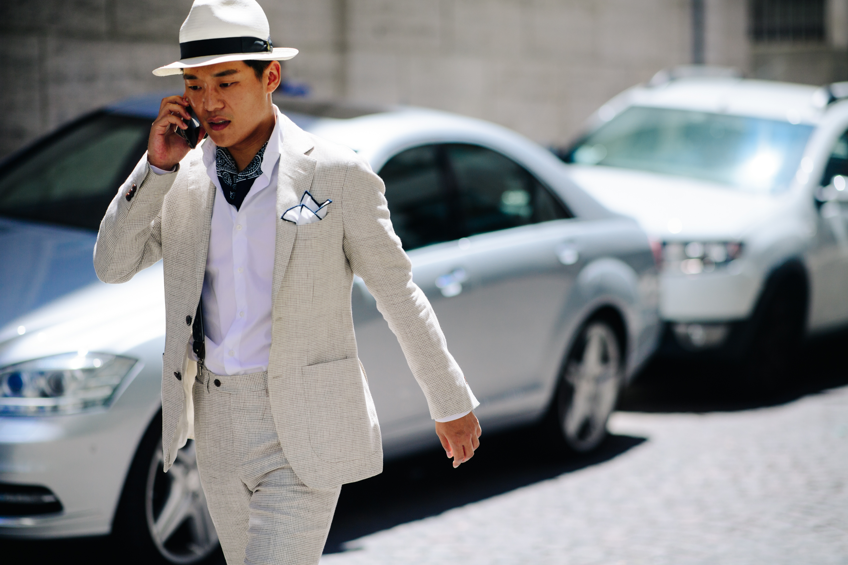 Korean man wearing a light grey suit