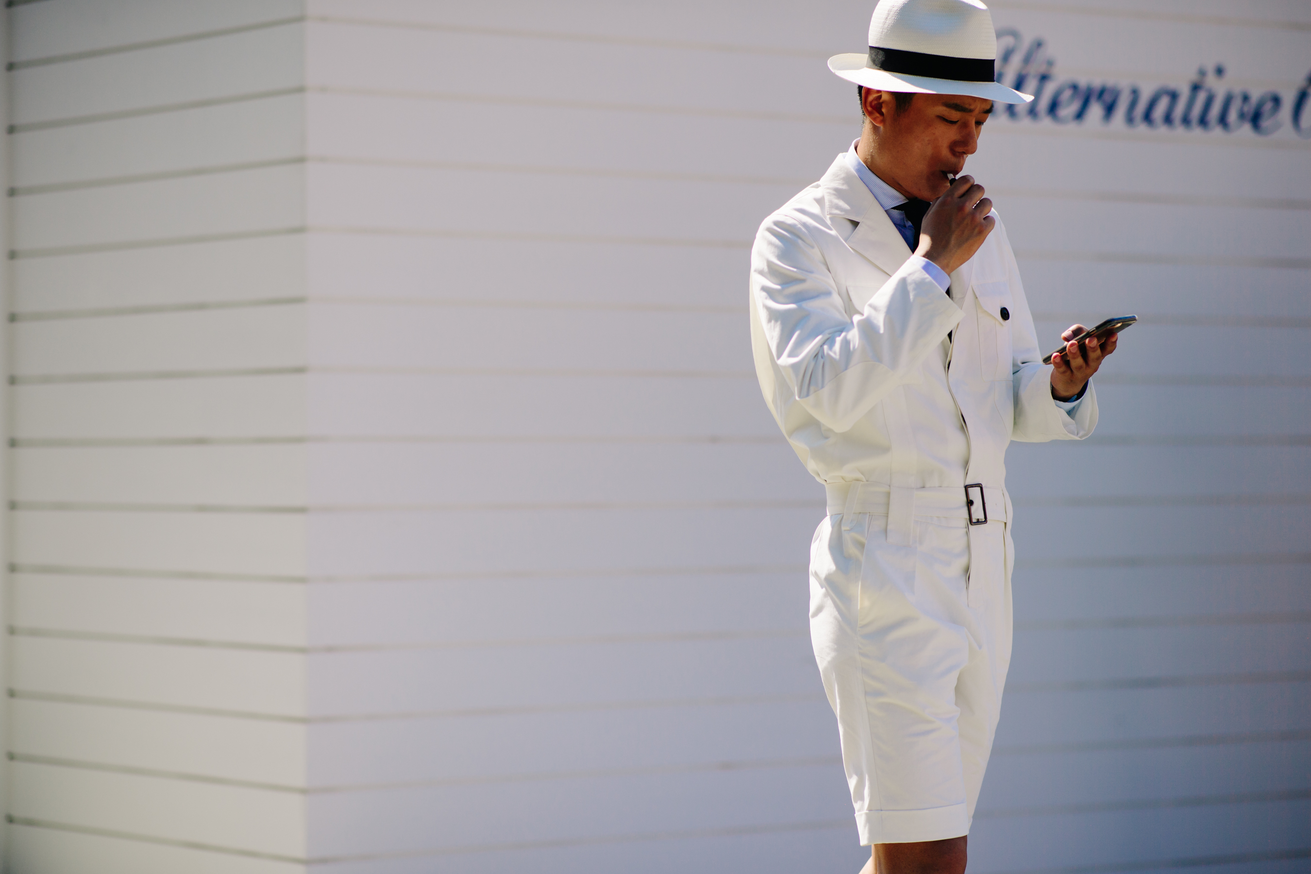 Man wearing white jumpsuit