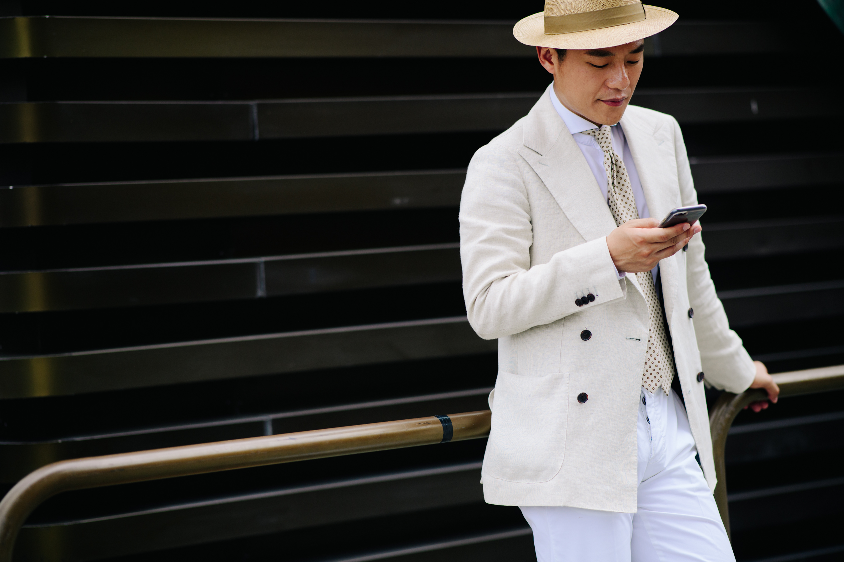Man wearing a white long jacket