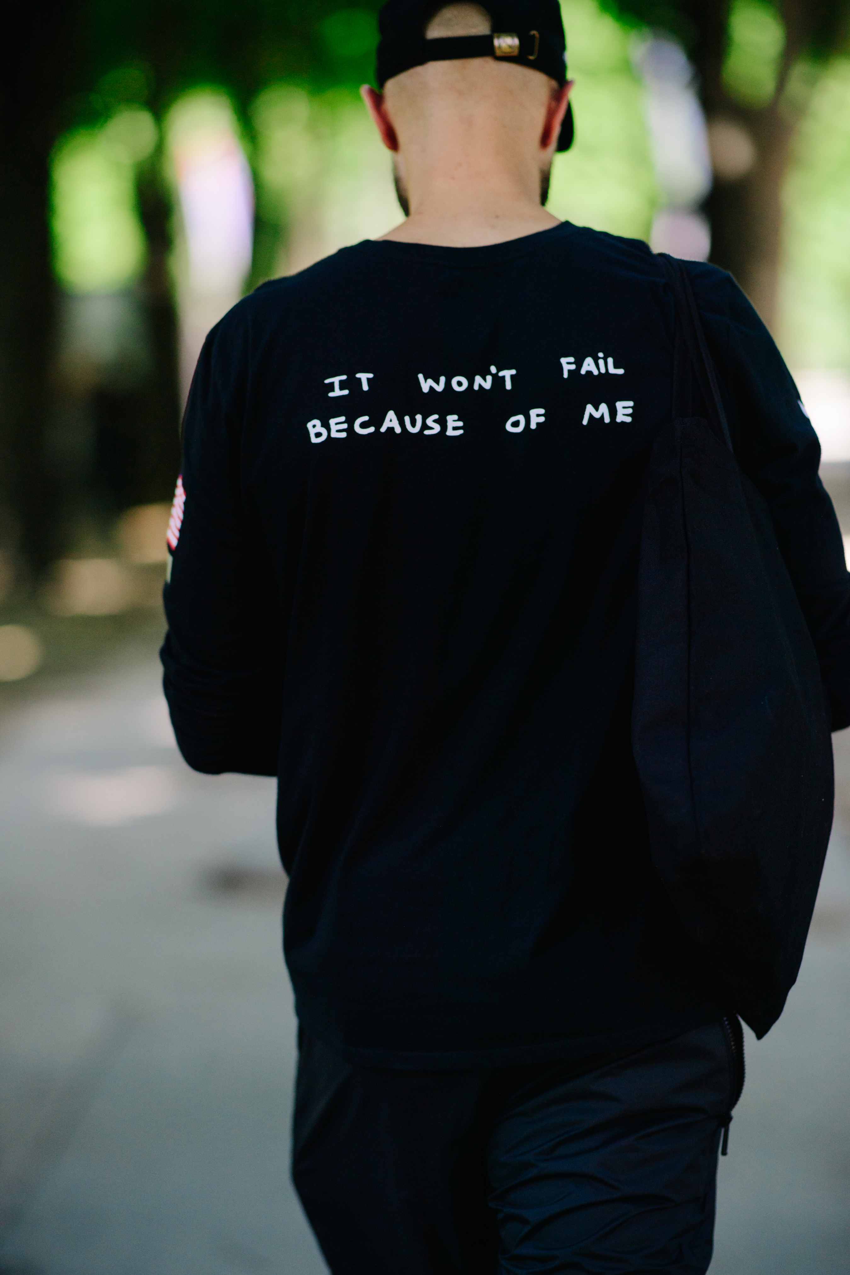 Man wearing a black sweatshirt
