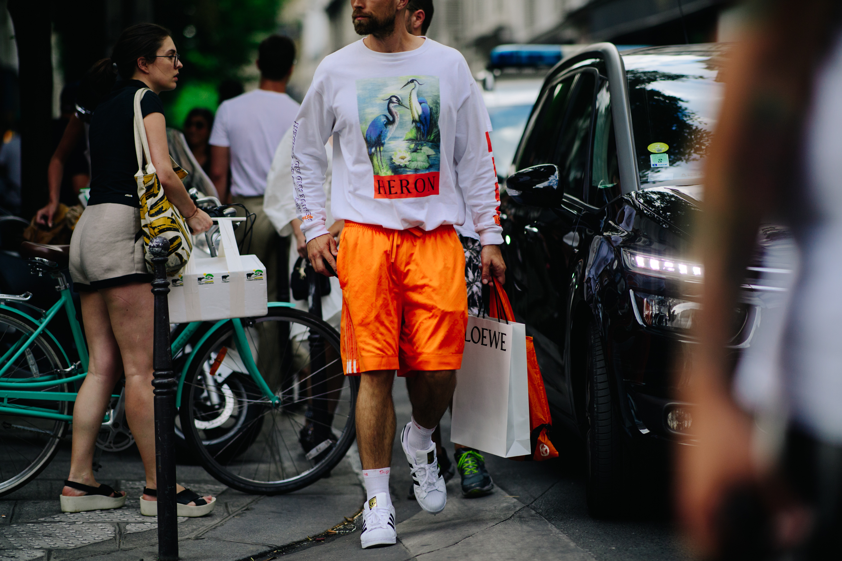 Man wearing Heron Preston and Adidas