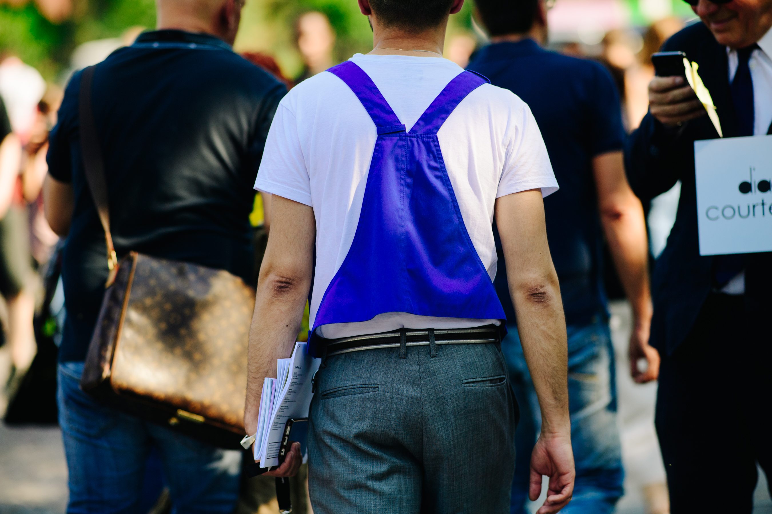 Man wearing pants and blue top