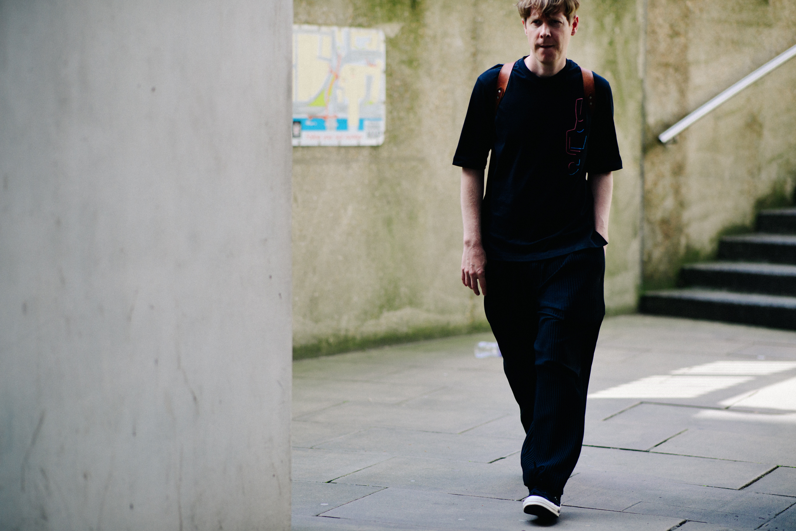 Man wearing wide black pants