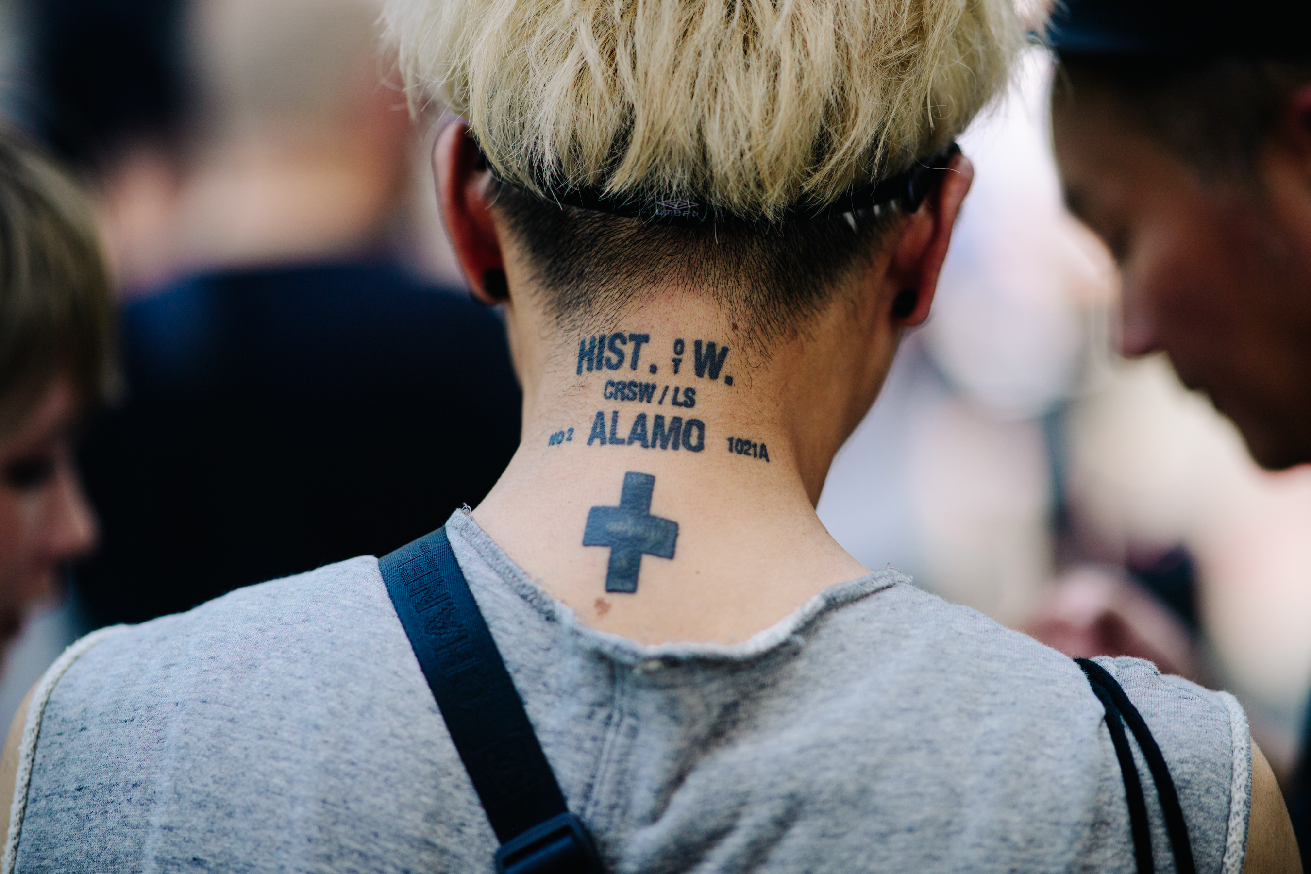 Tattoed Japanese man with Chanel bag
