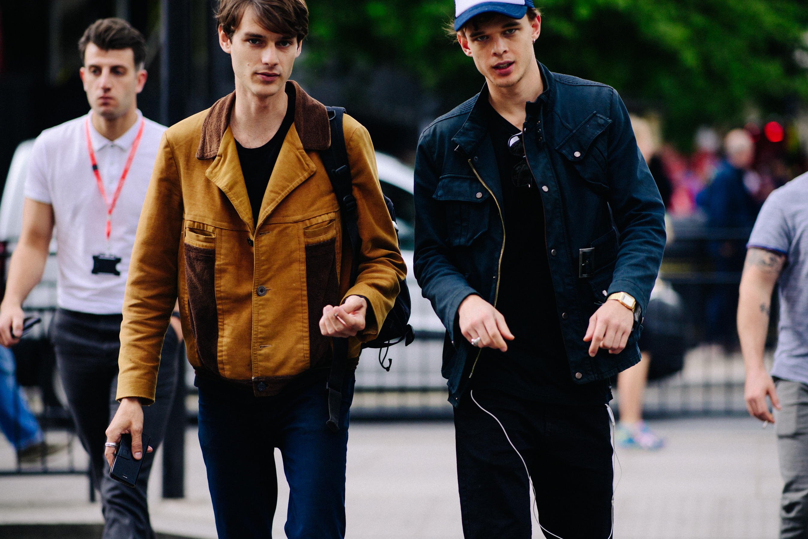 Two male models after a show