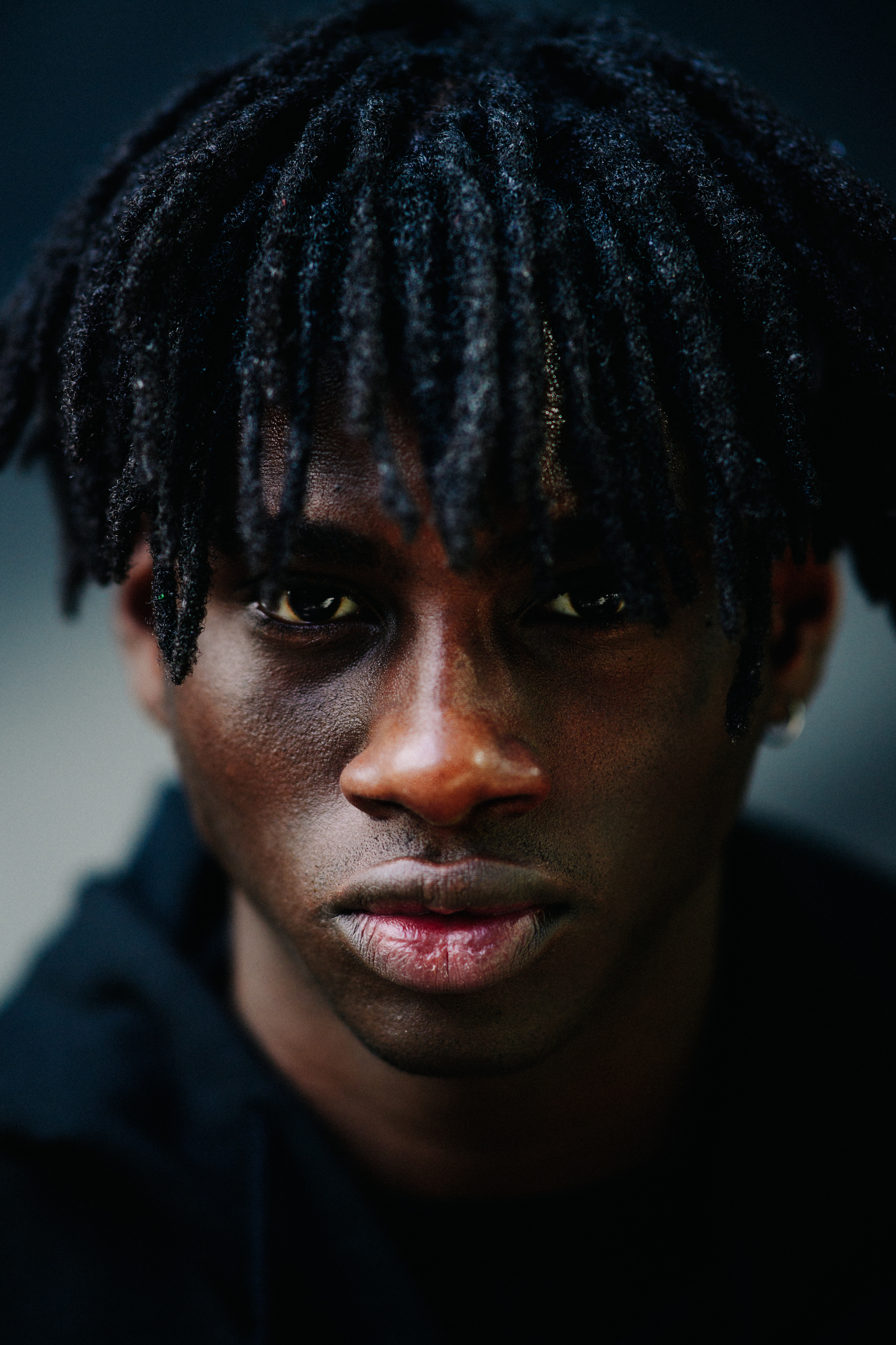 Portrait of male model after a show
