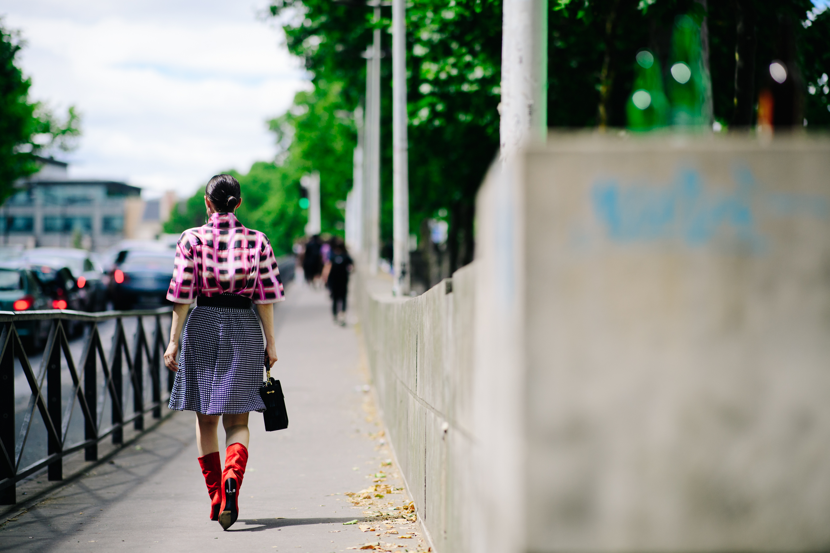 Woman wearing a checkered skirt