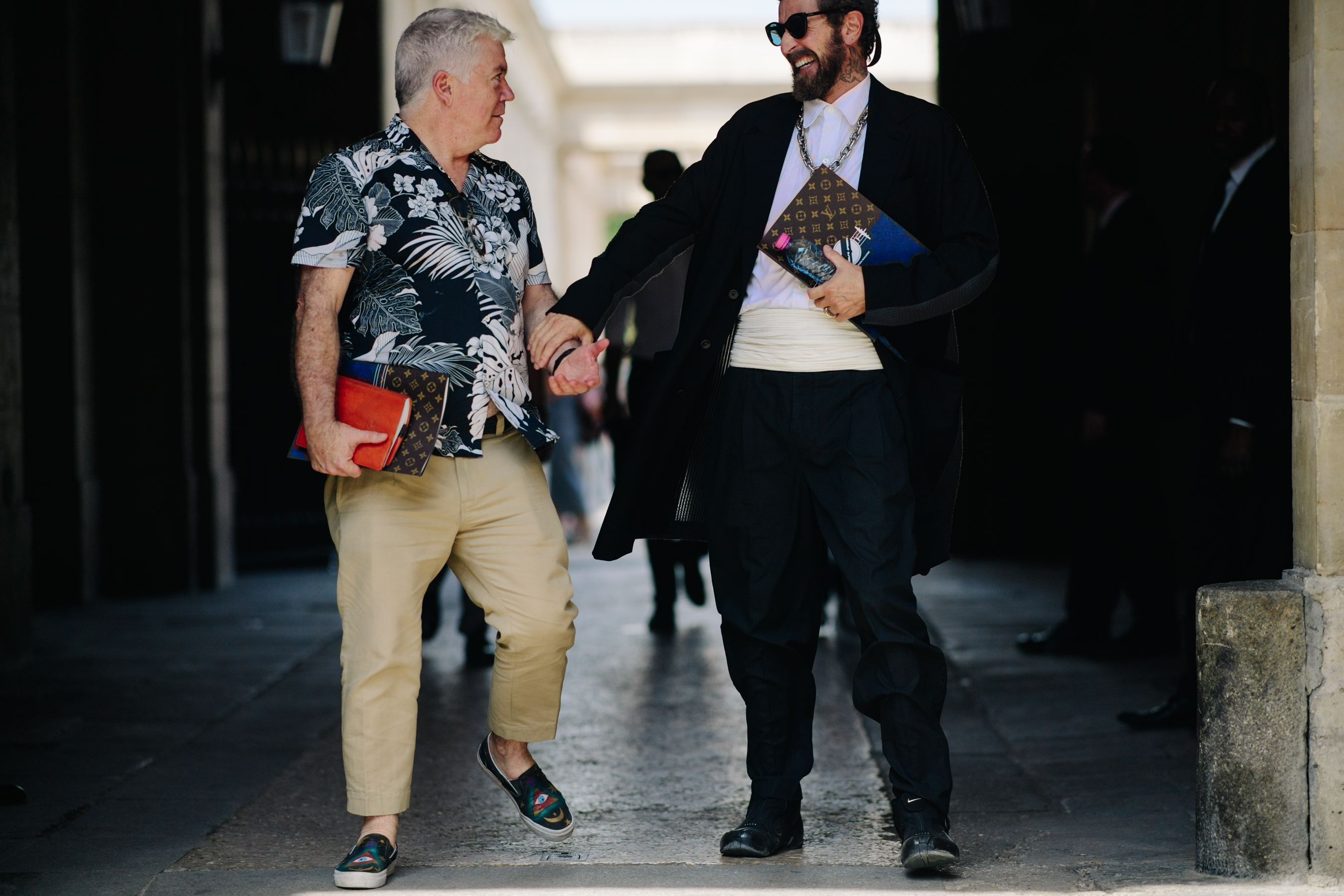 Fashion journalists wearing Kenzo and Nike