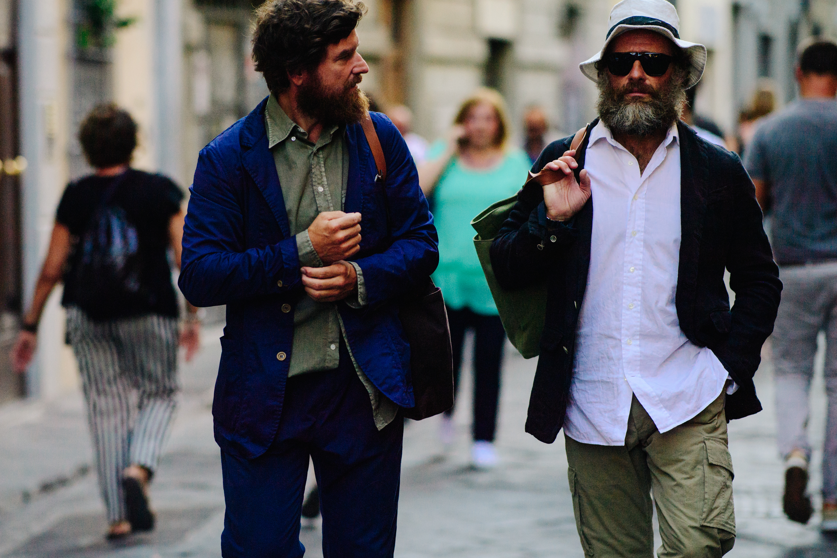 Two men wearing long beards