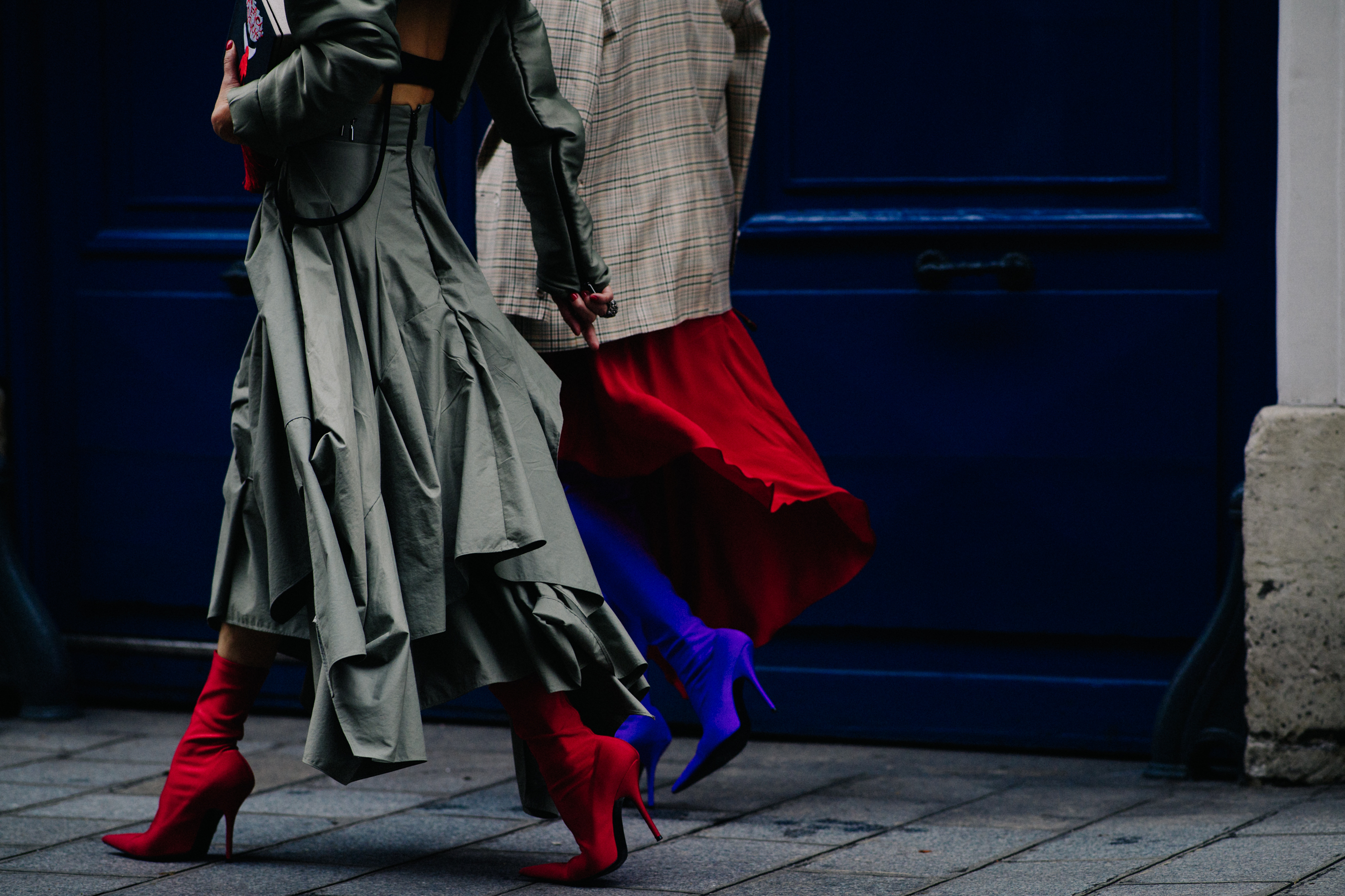 Two women wearing Balenciaga boot tights