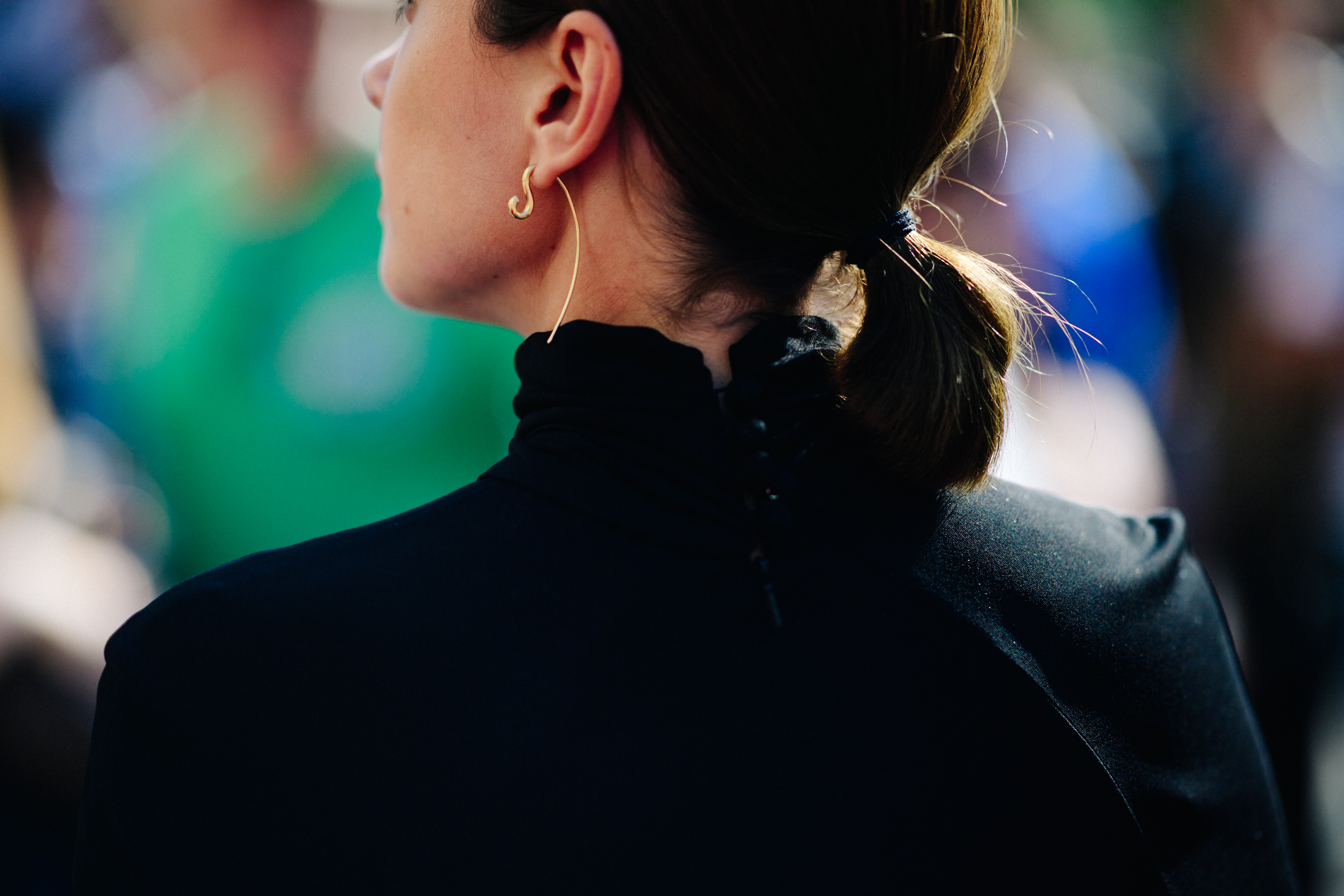 Woman wearing golden earring
