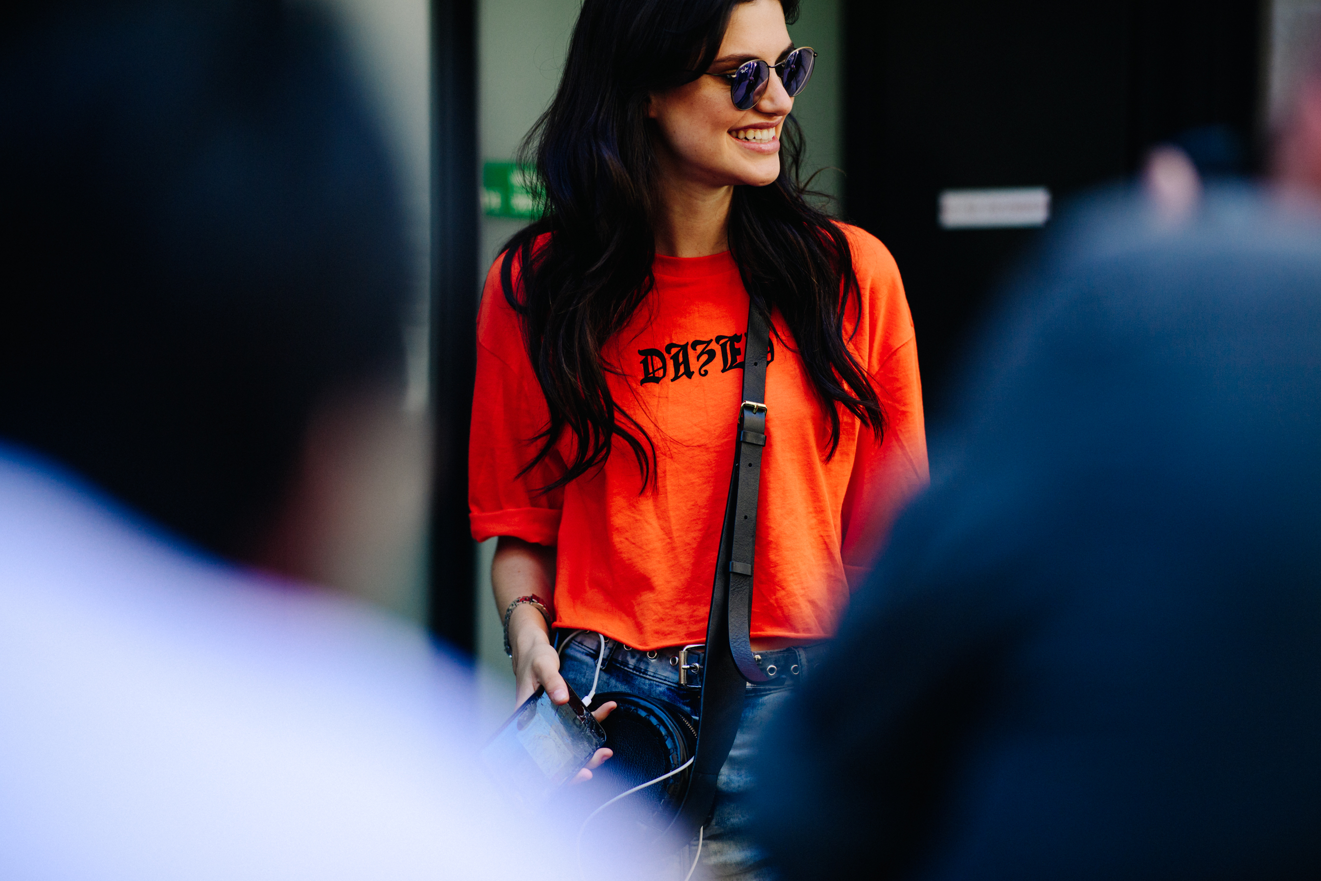 Woman wearing an orange t-shirt