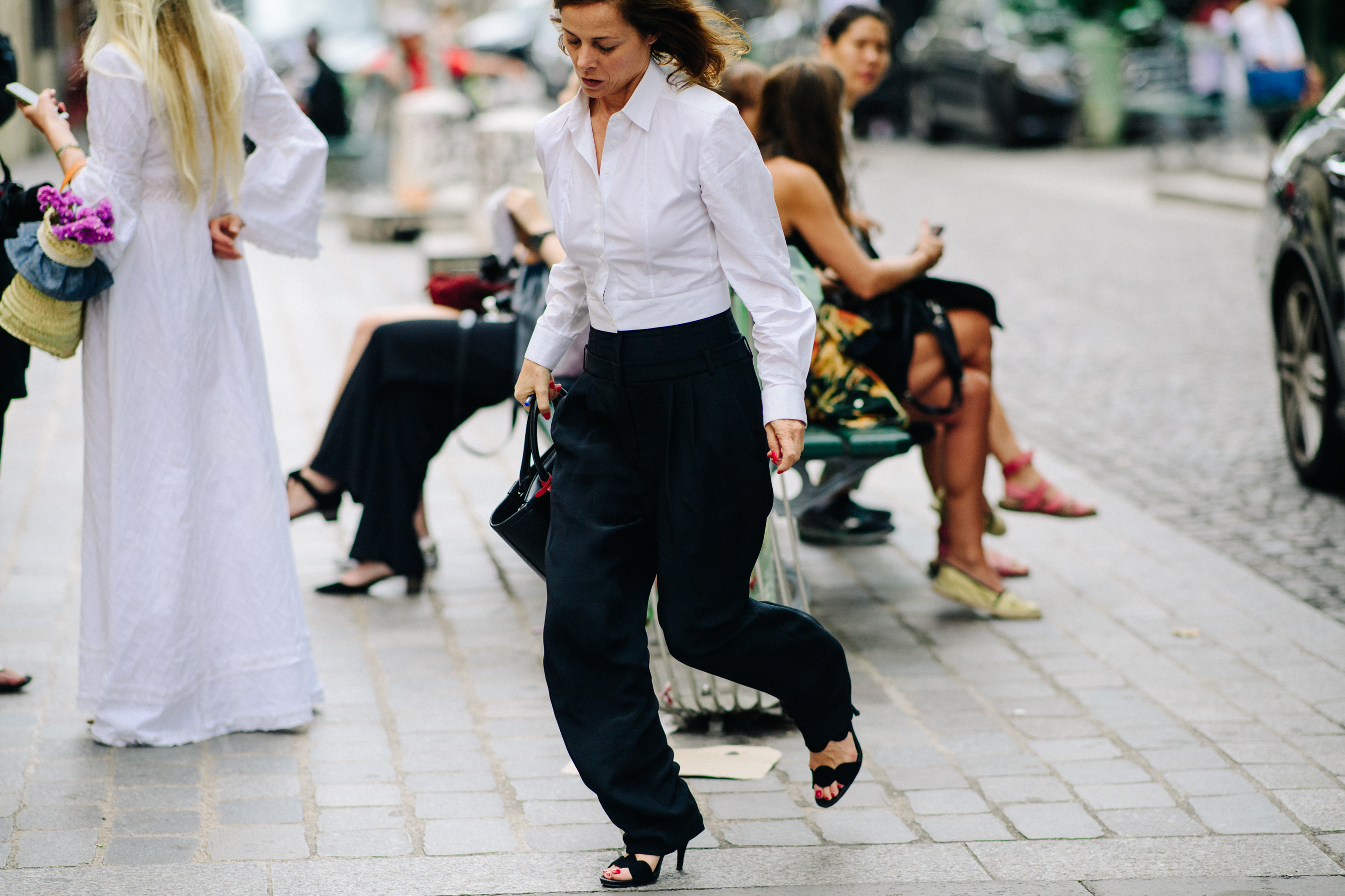 Woman wearing shirt and suit pants
