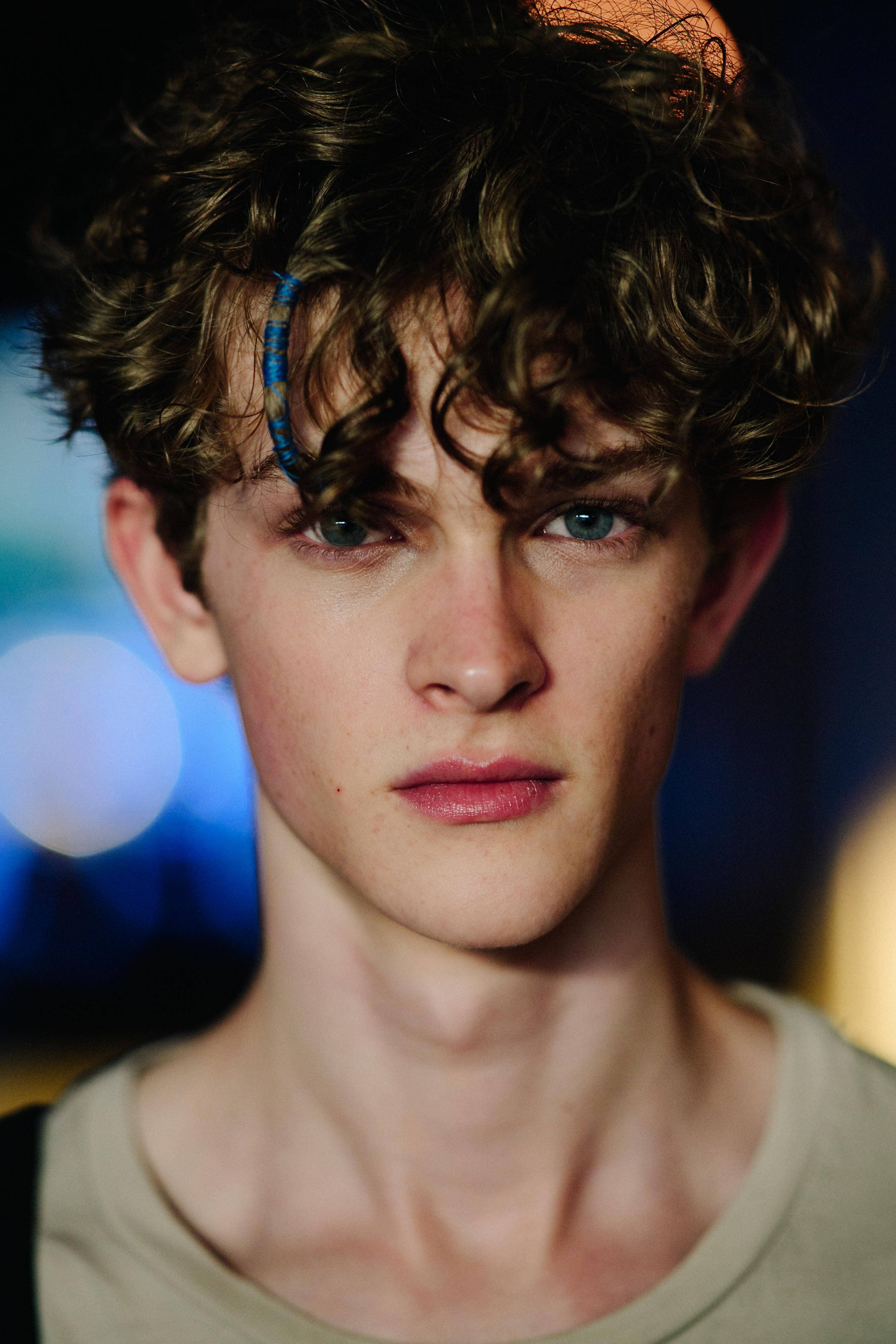 Portrait of a male model after a show