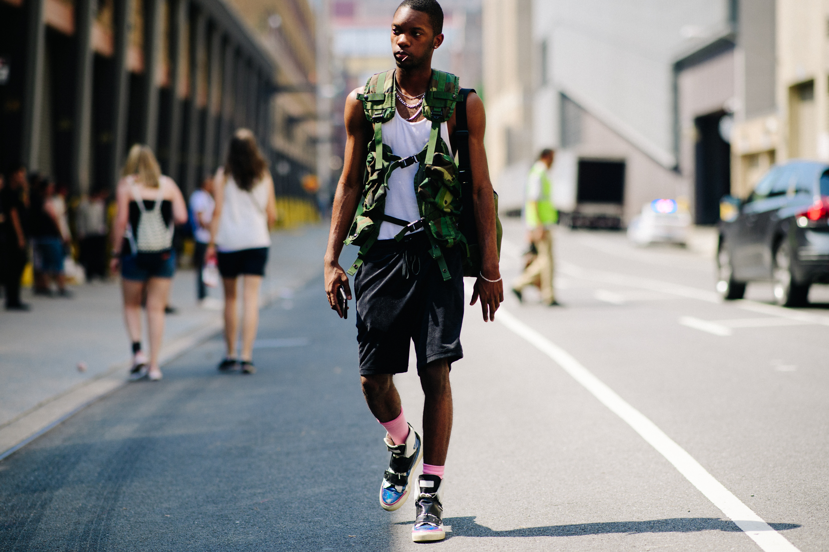 Male model wearing camo vest