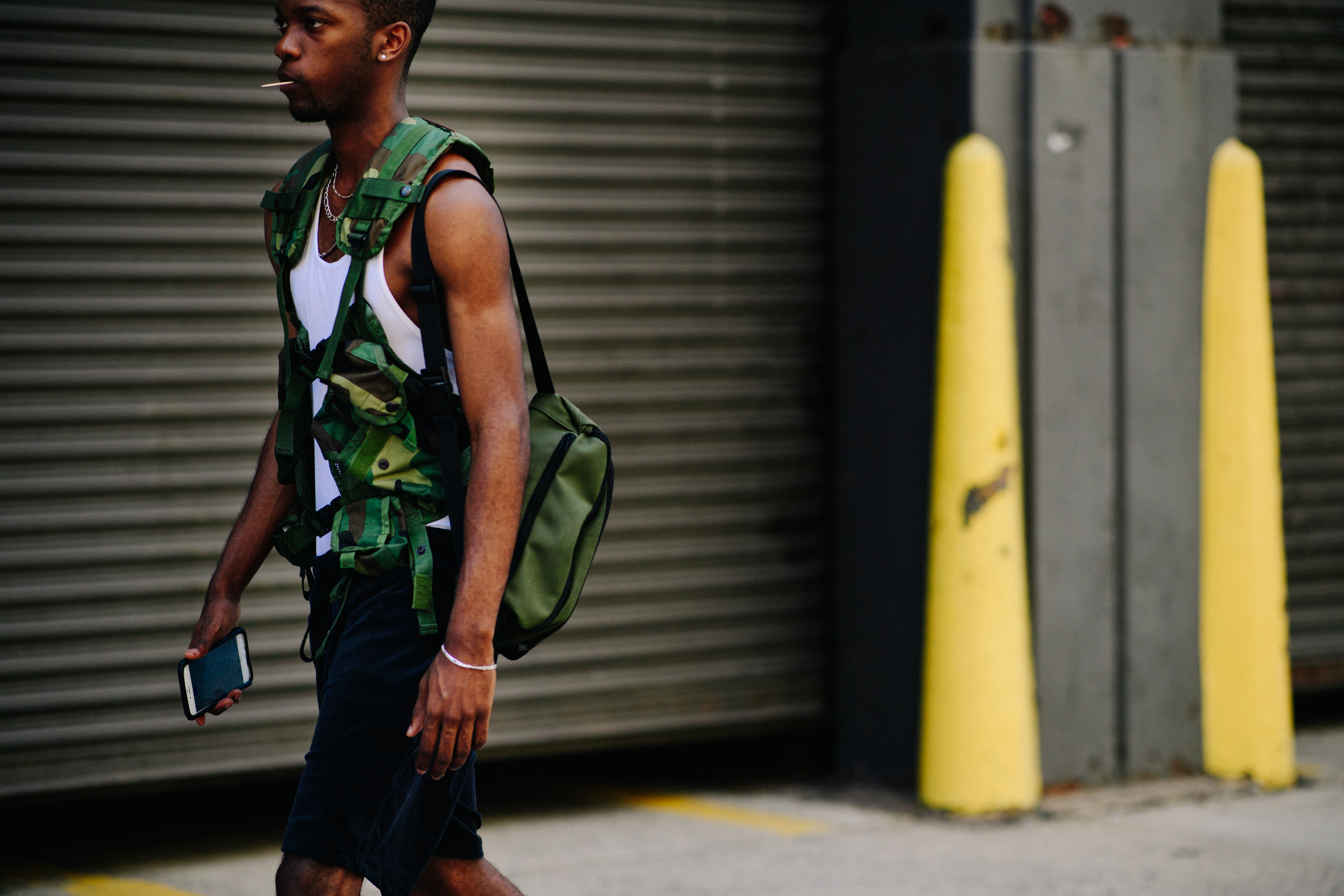 Male model wearing camo vest