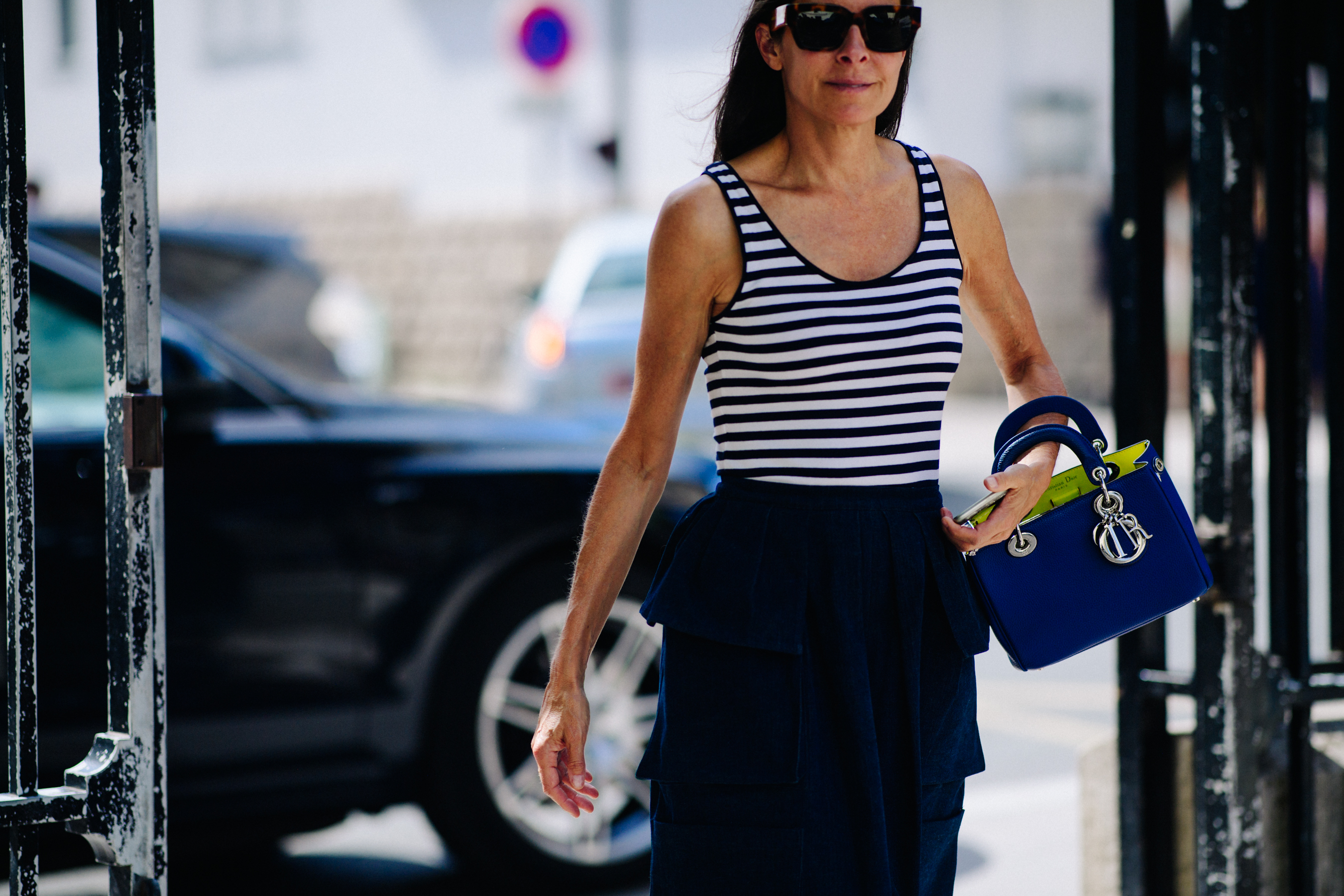 Woman carrying a Christian Dior bag