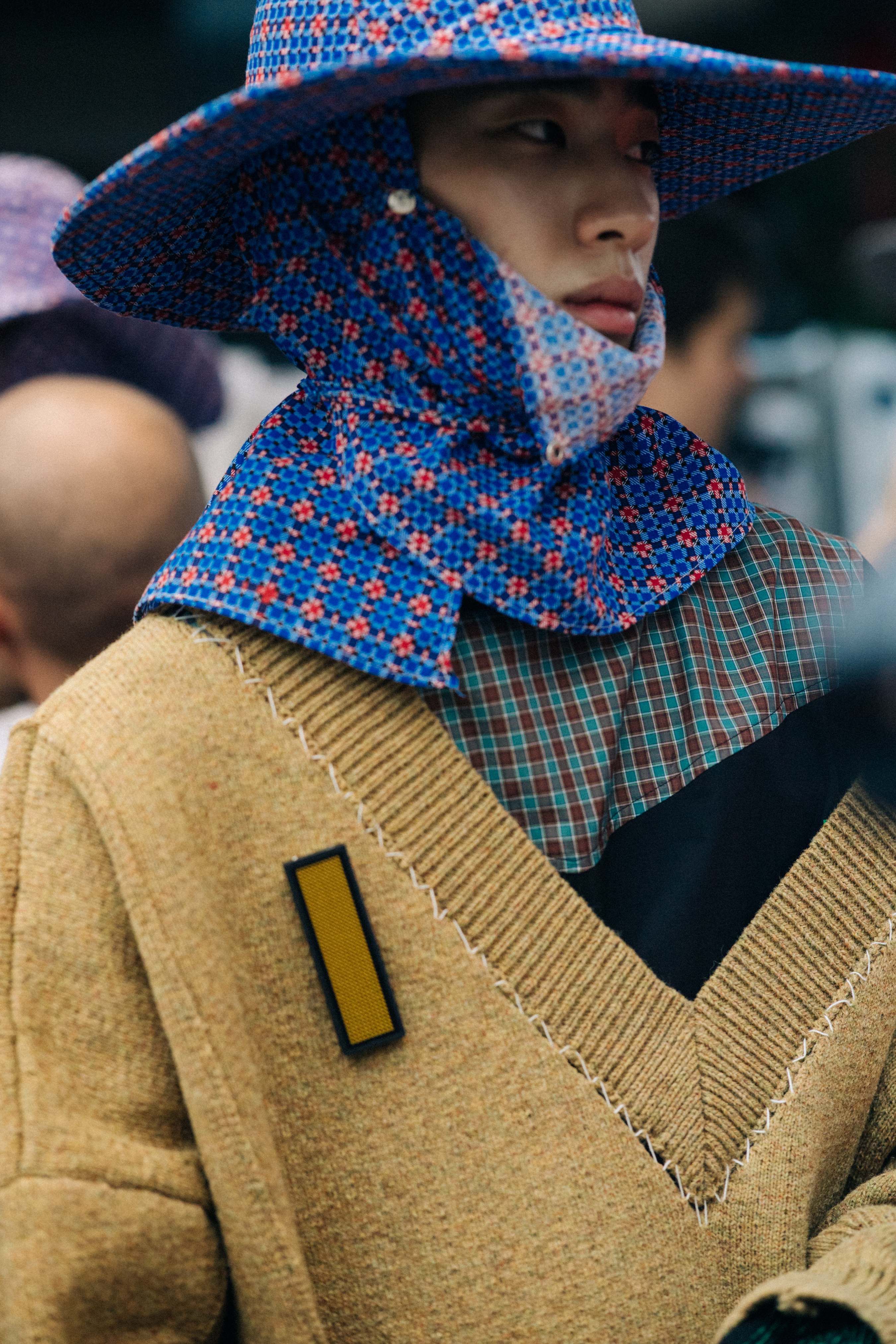 Male model wearing purple fishing hat