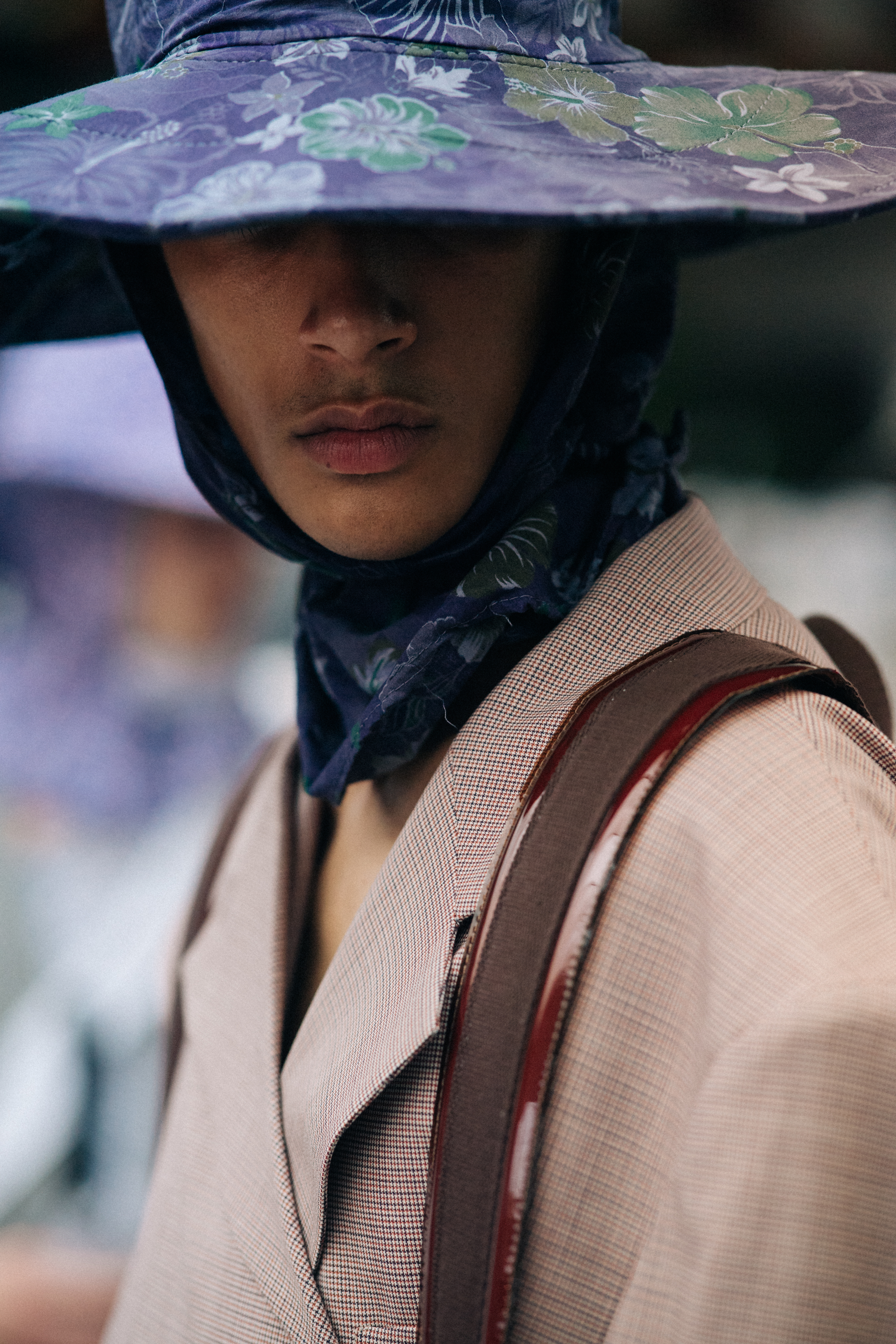 Male model wearing purple fishing hat