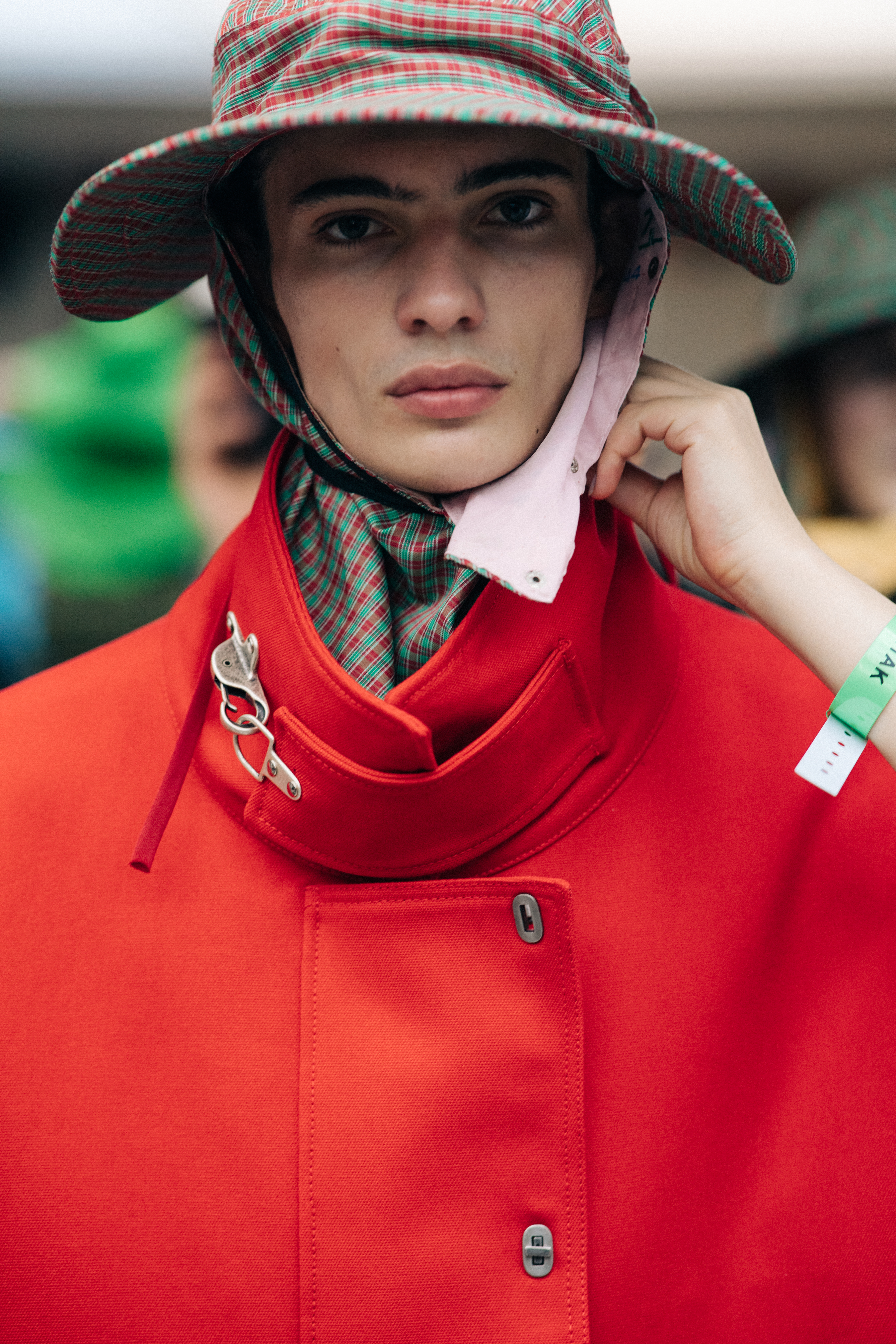 Male model wearing red coat