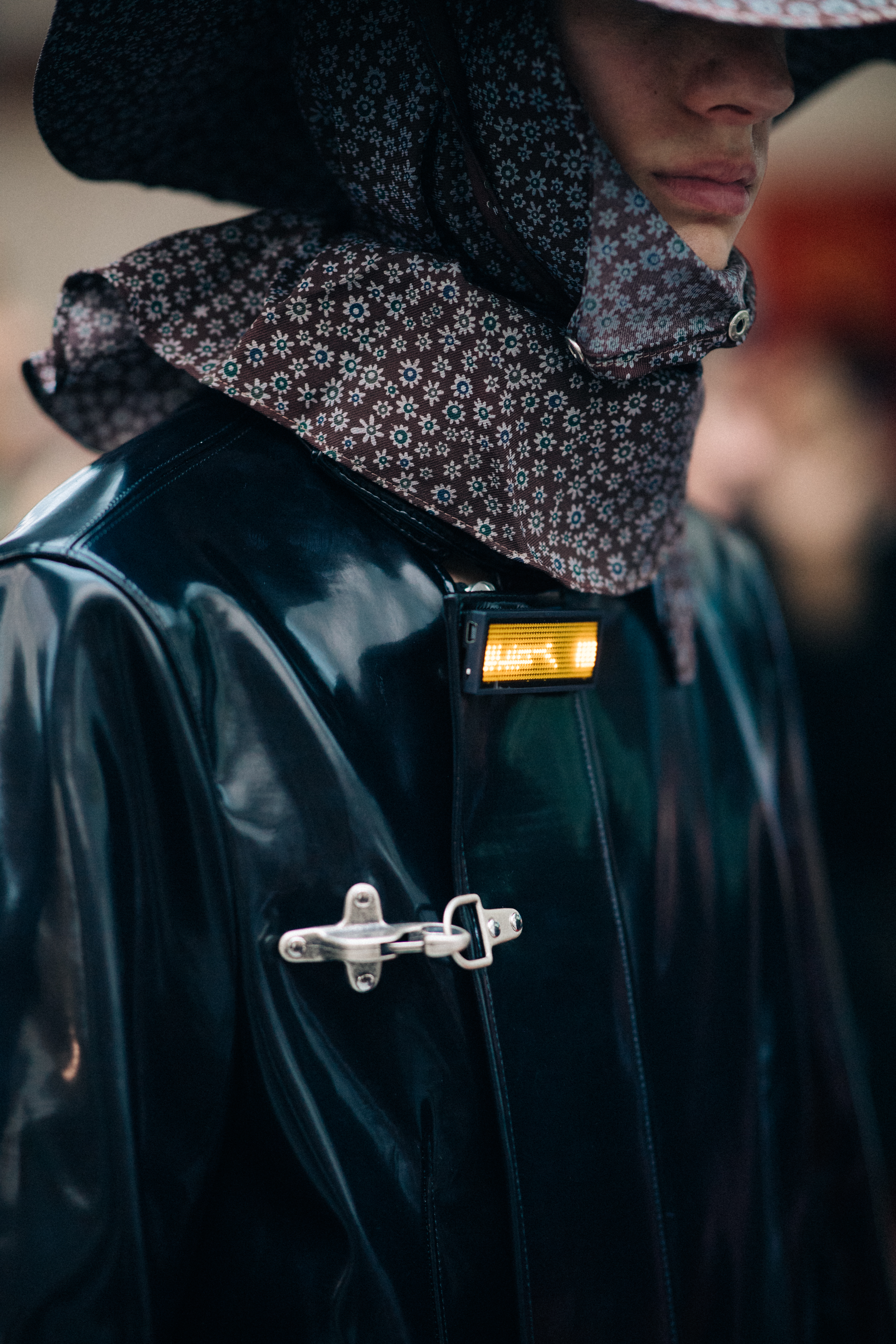 Male model wearing leather rain coat