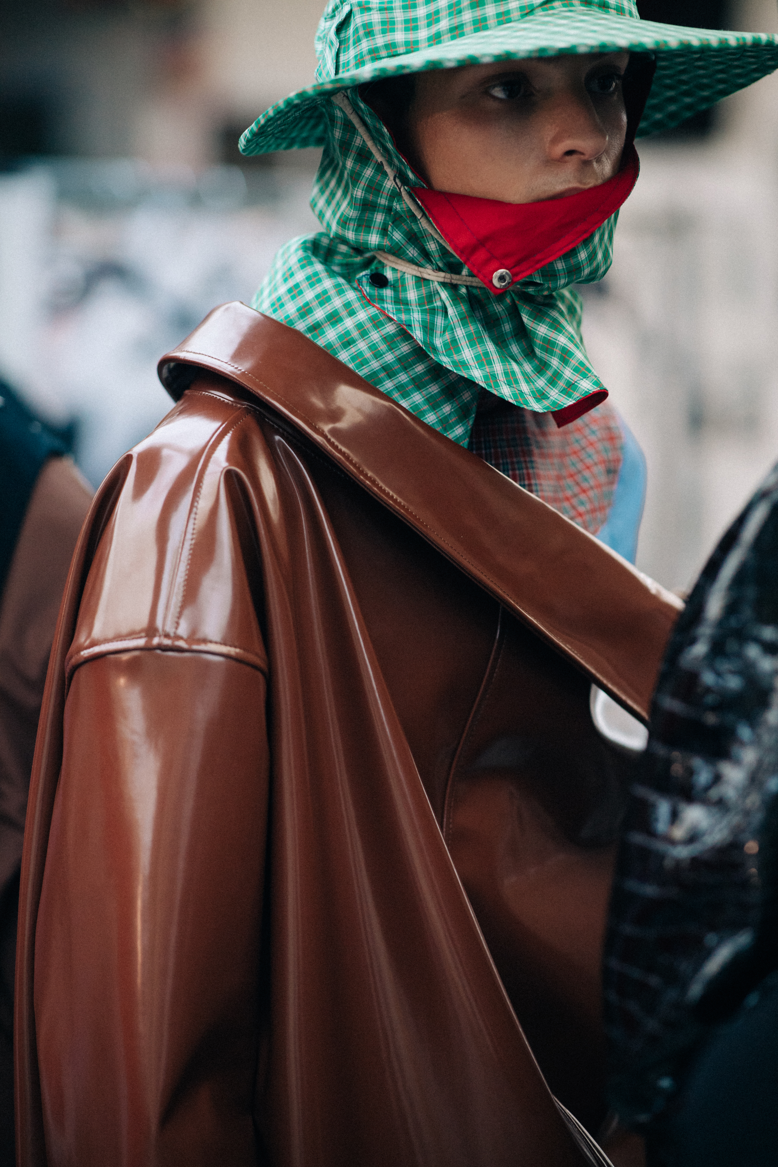 Male model wearing leather rain coat