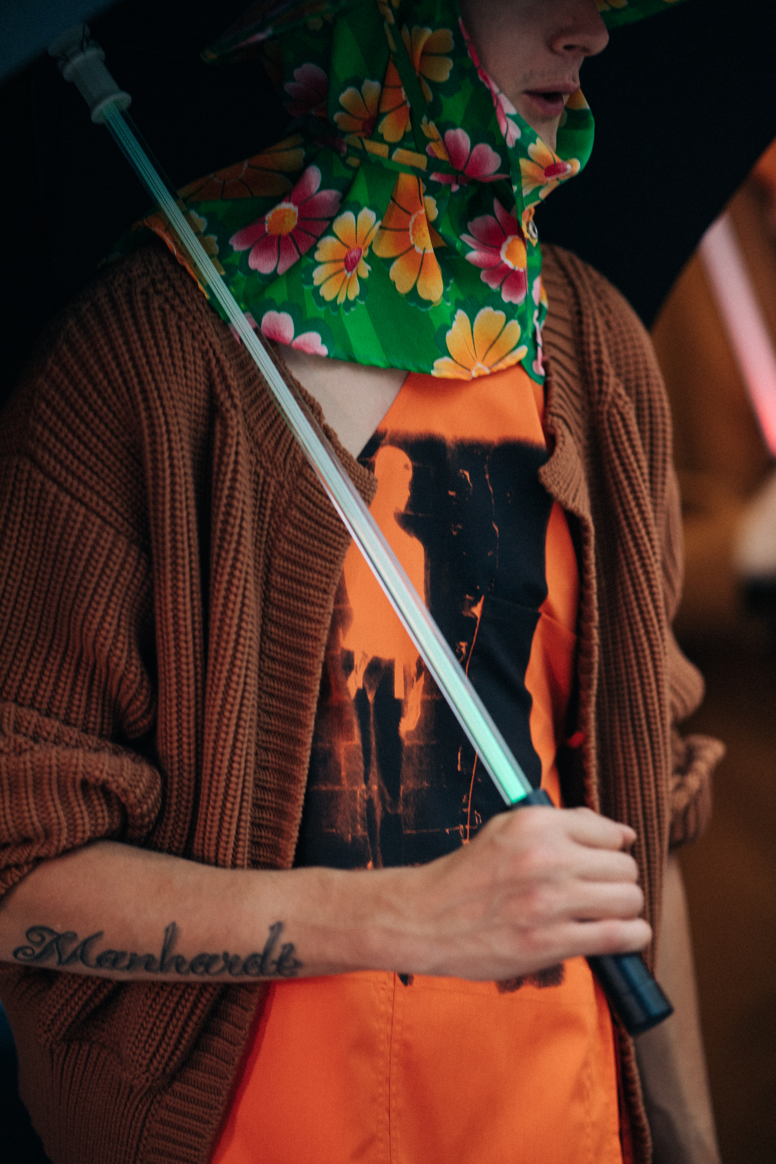 Male model wearing floral head piece
