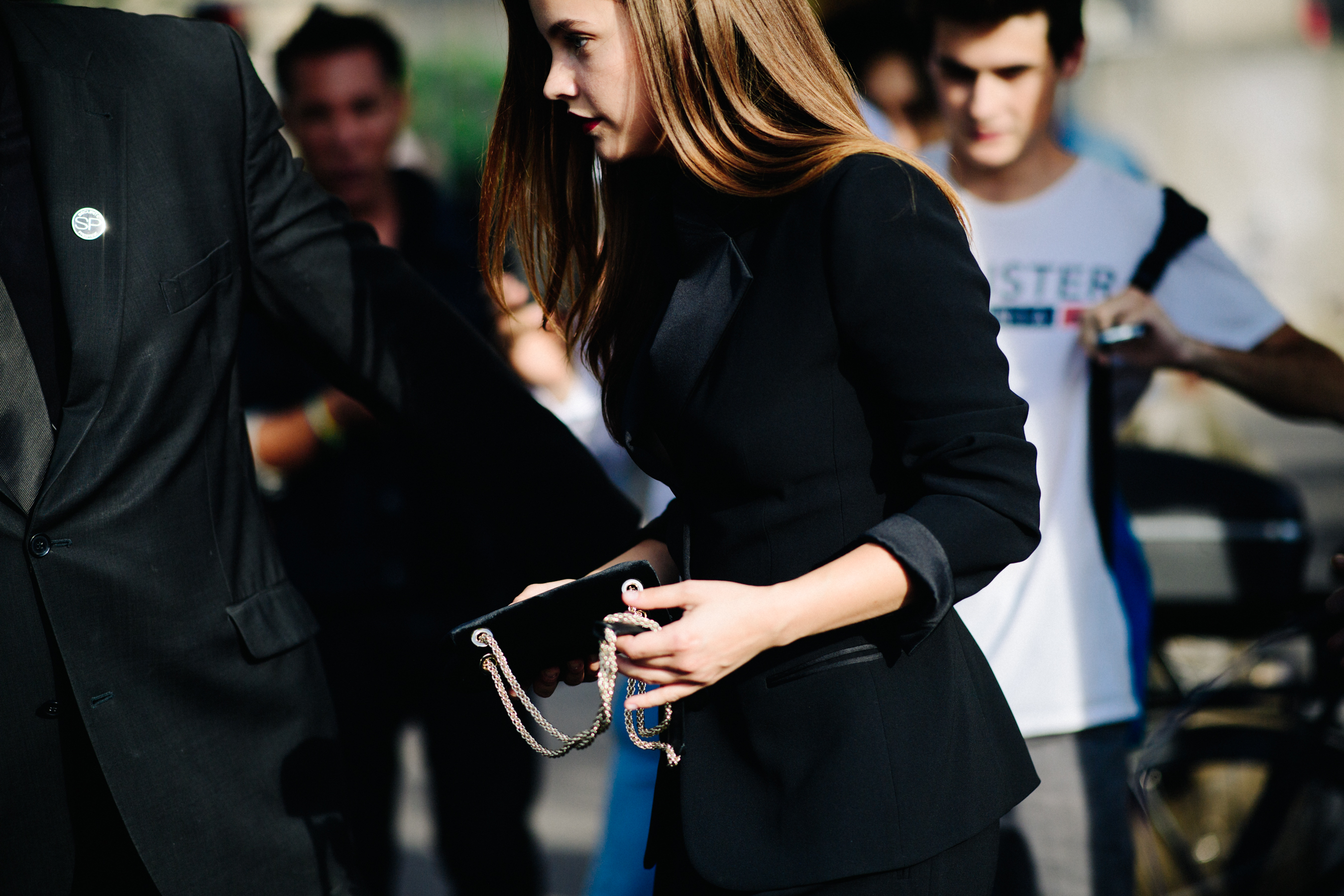 Woman wearing black tuxedo