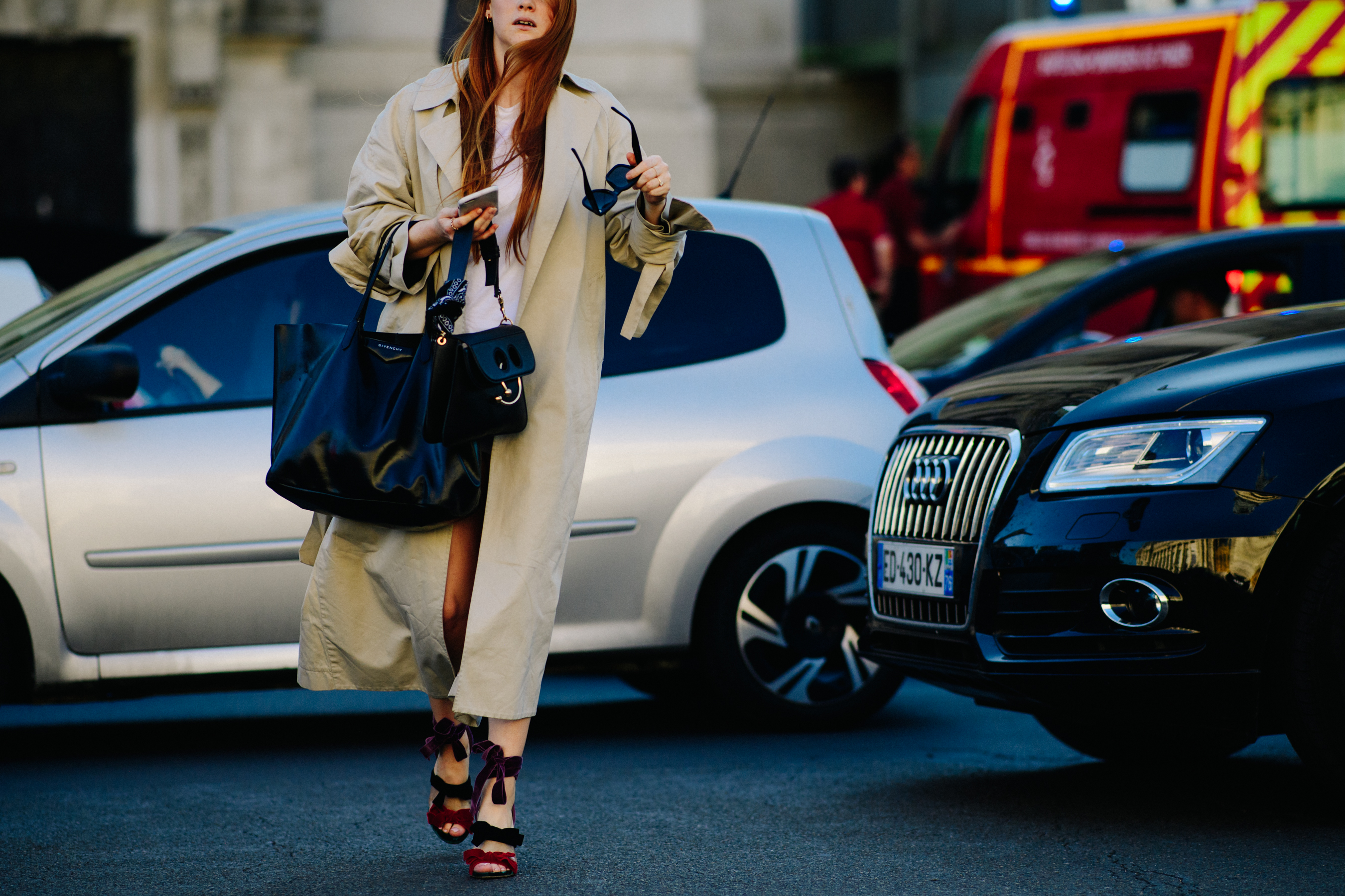 Woman wearing long trench coat