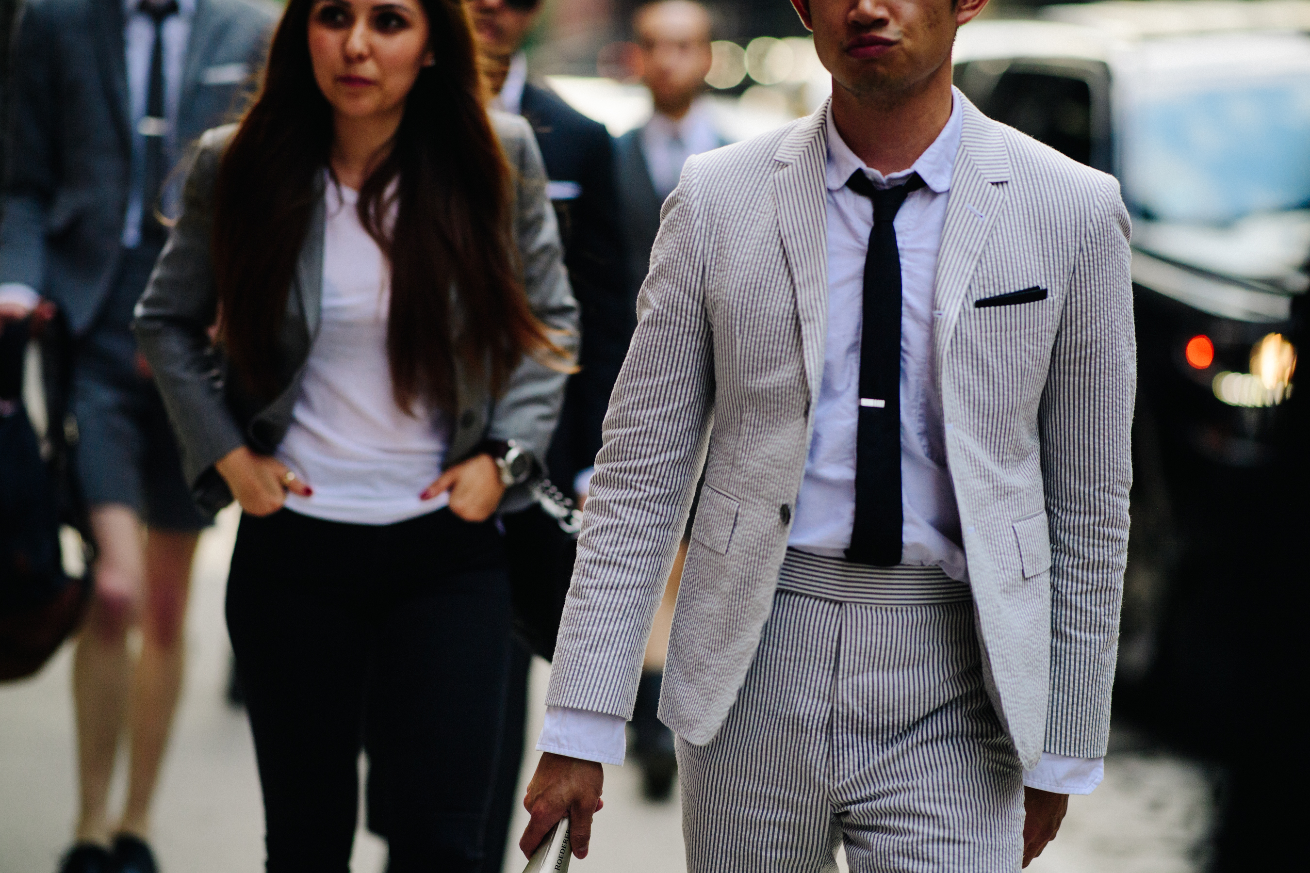 Man wearing white stripey suit