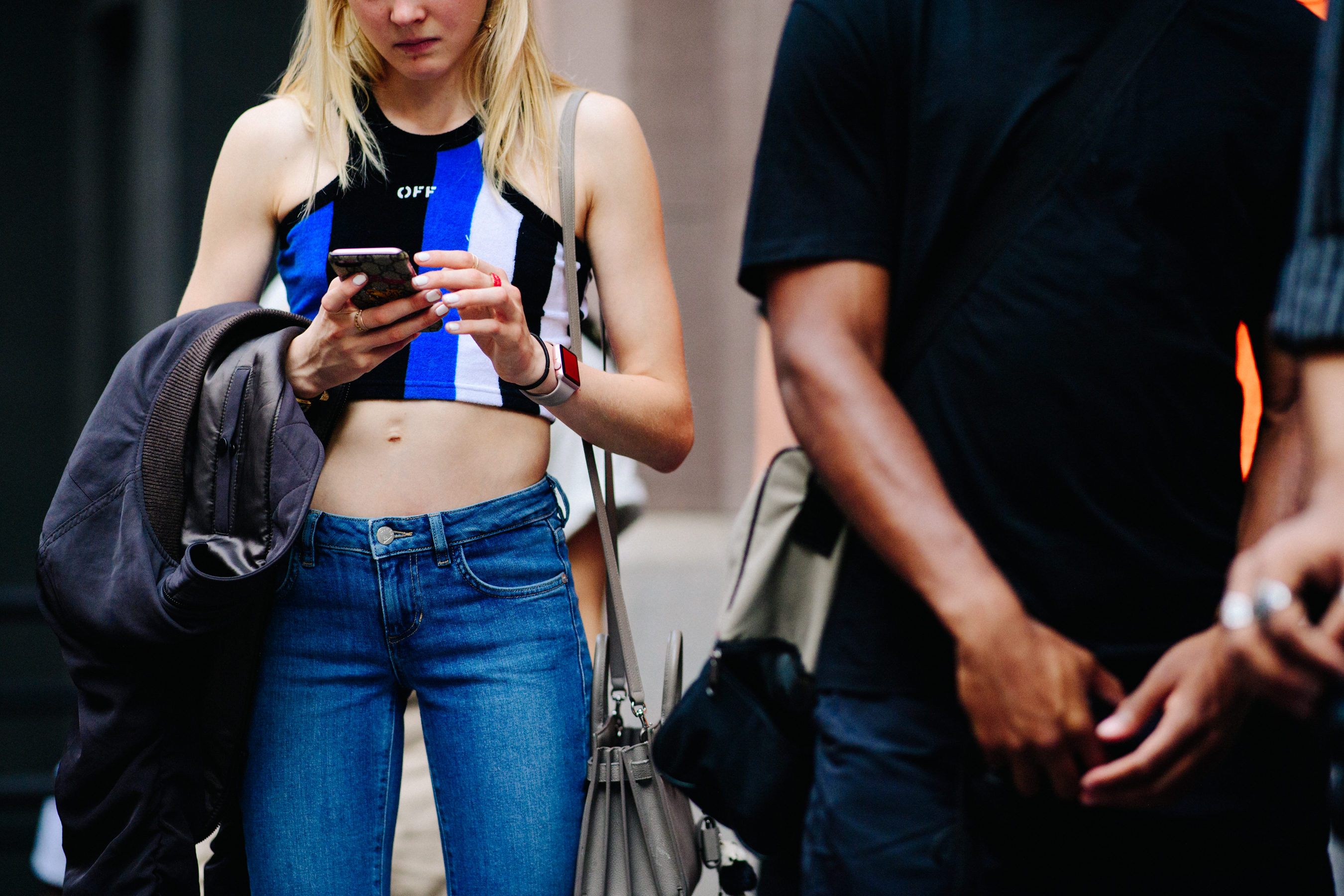 Girl wearing Off-White mini top