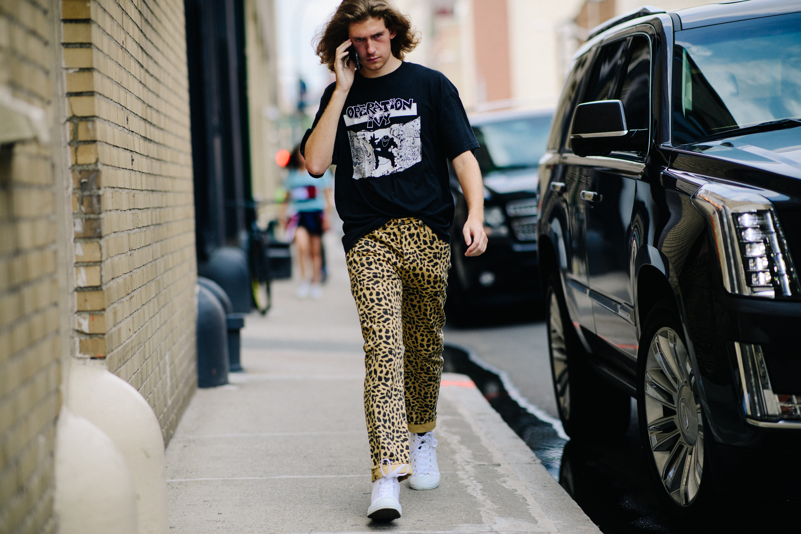 Man wearing animal print pants