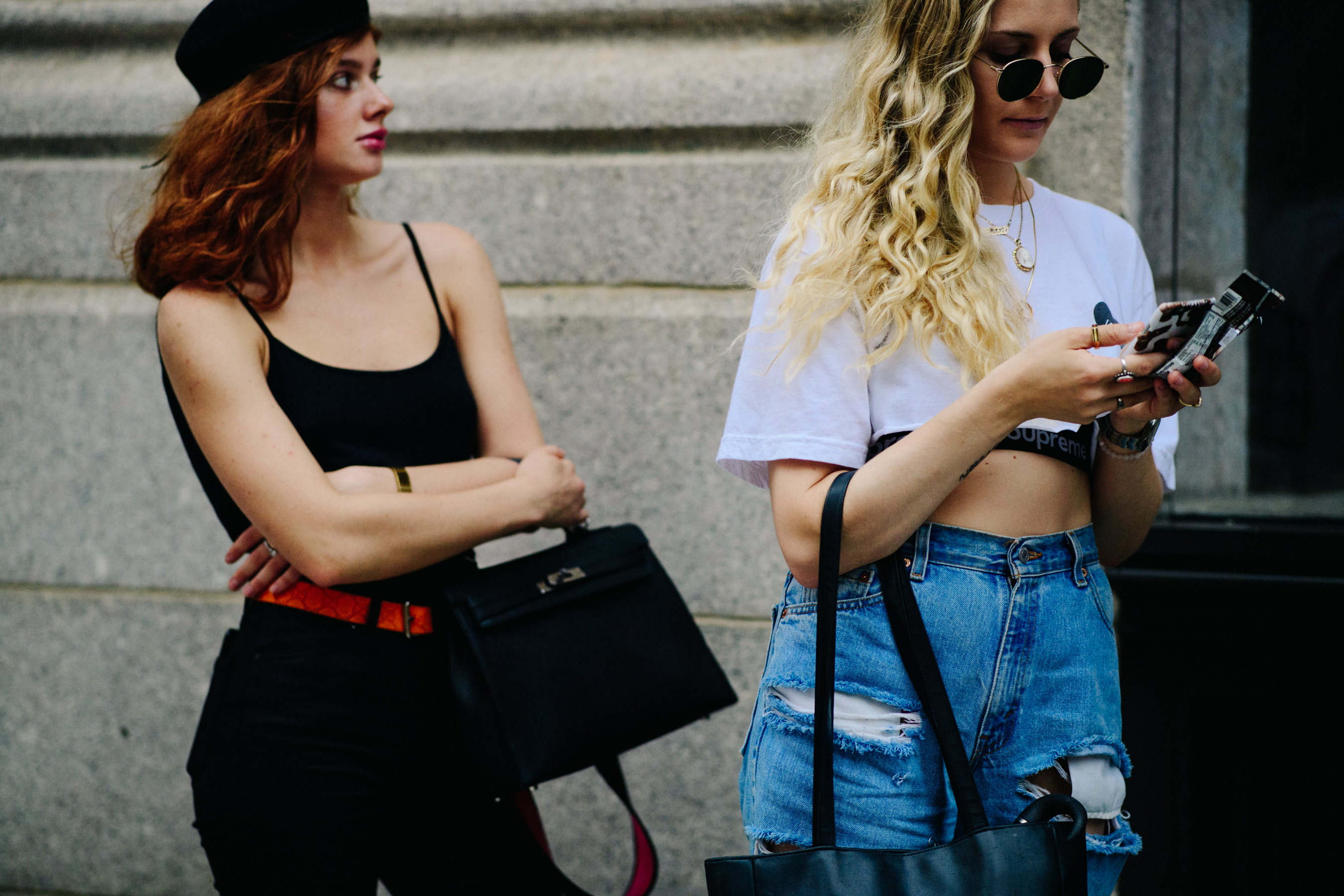 Two girls wearing crop tops