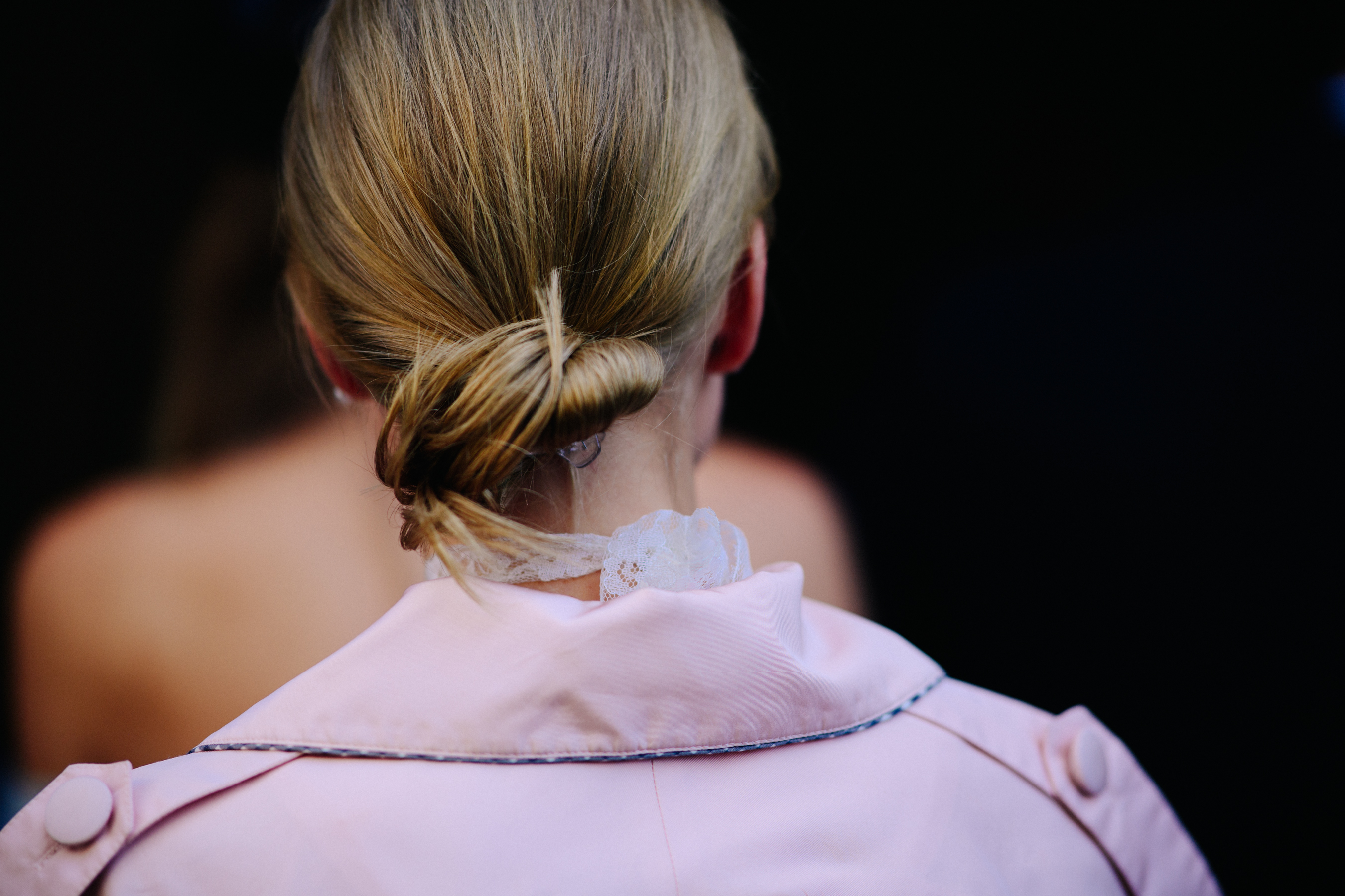 Woman wearing pink blazer