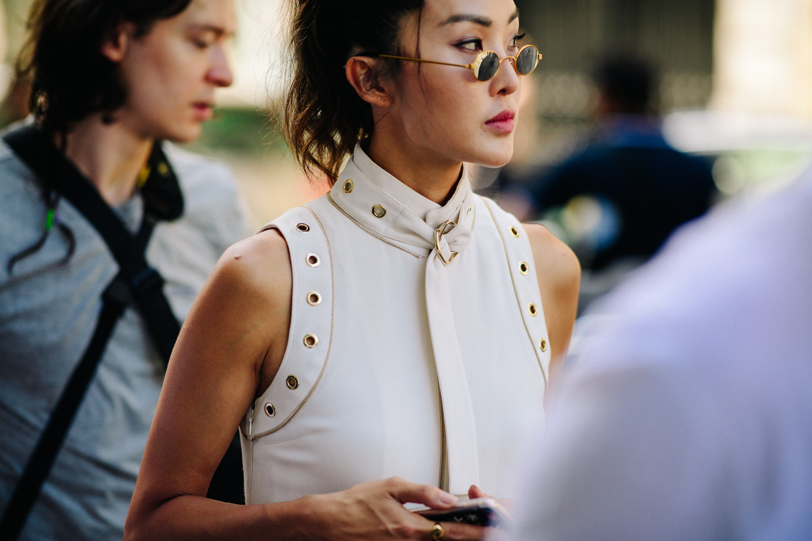 Woman wearing small yellow shades