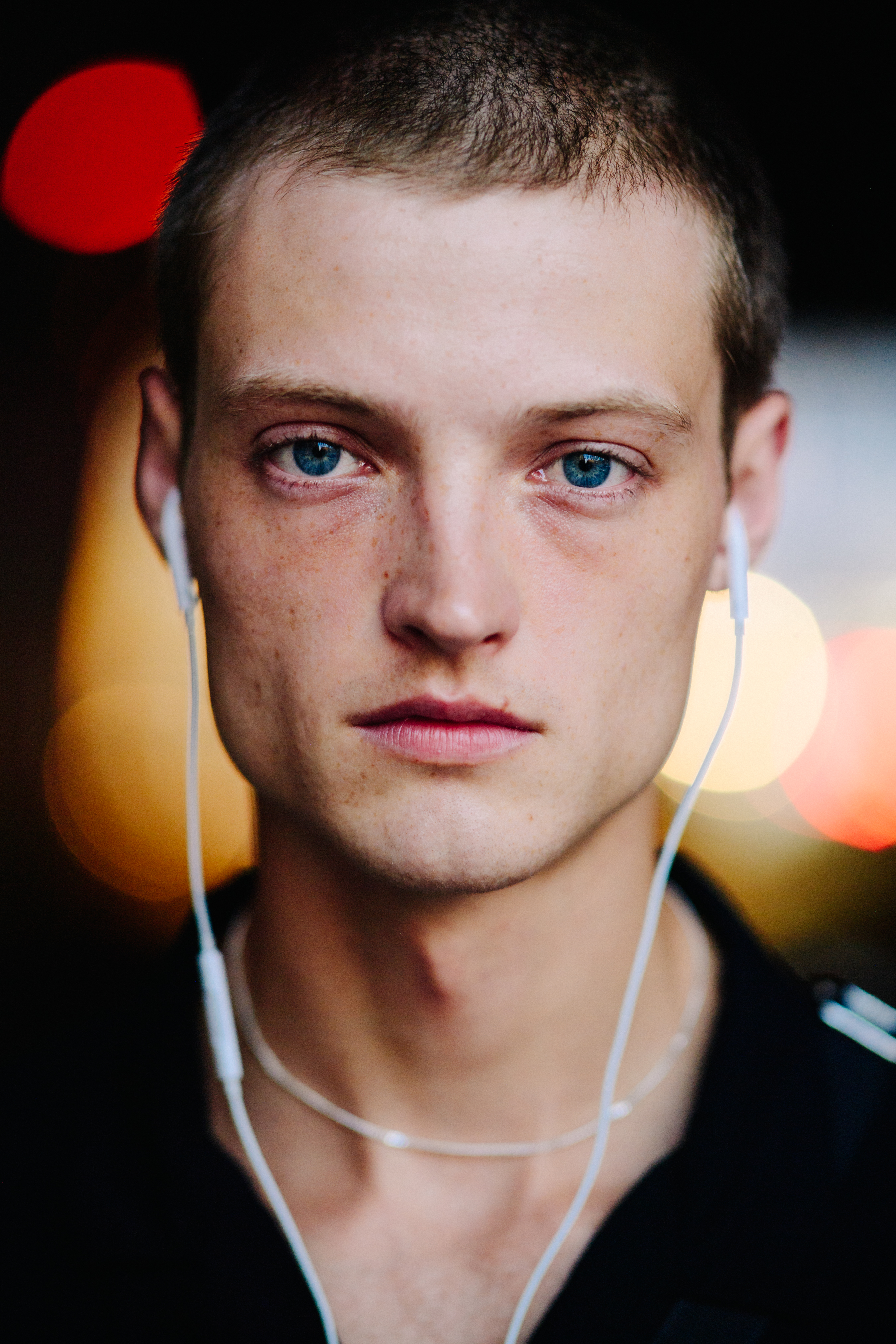 Portrait of a male model after a show