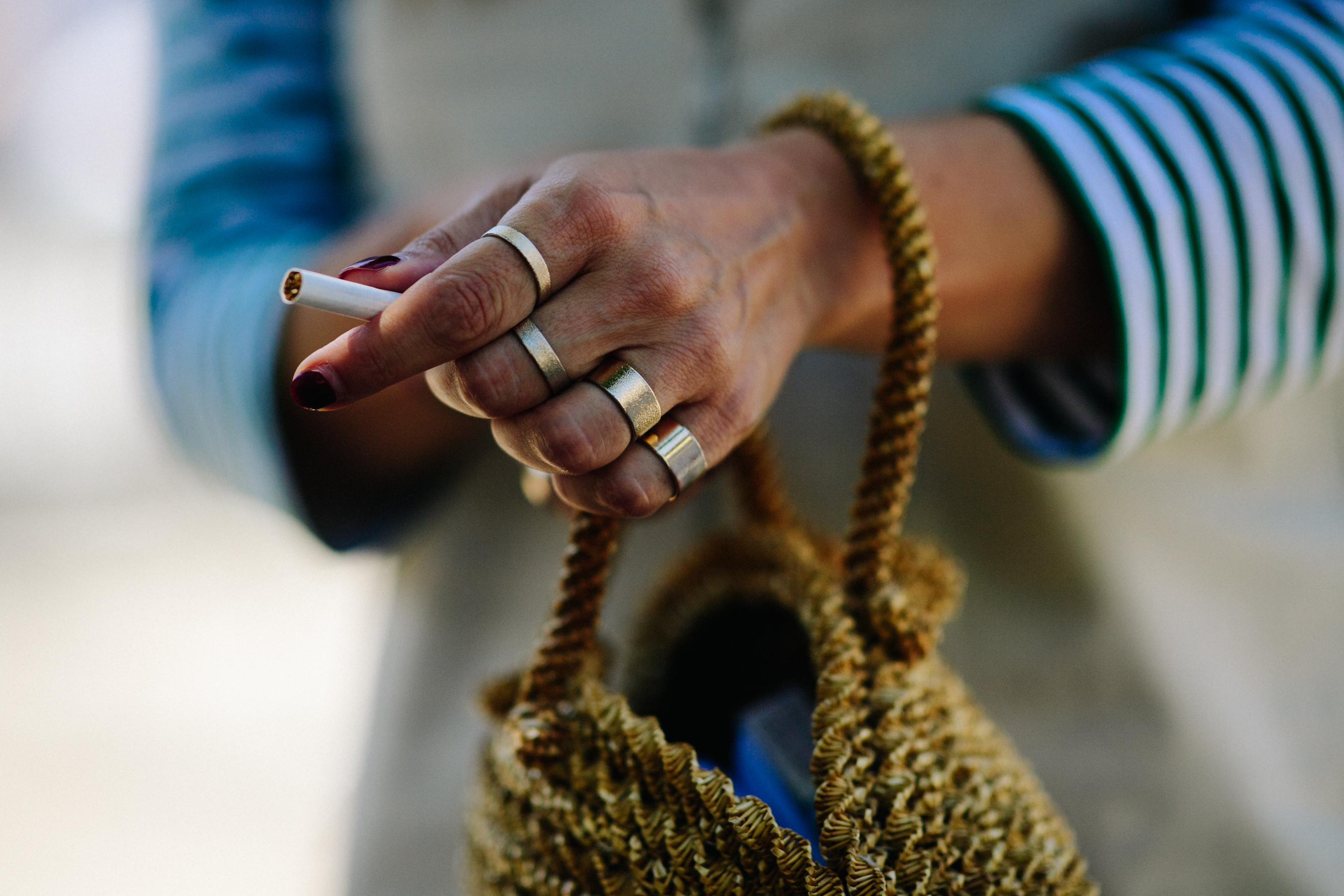 Woman wearing several silver rings