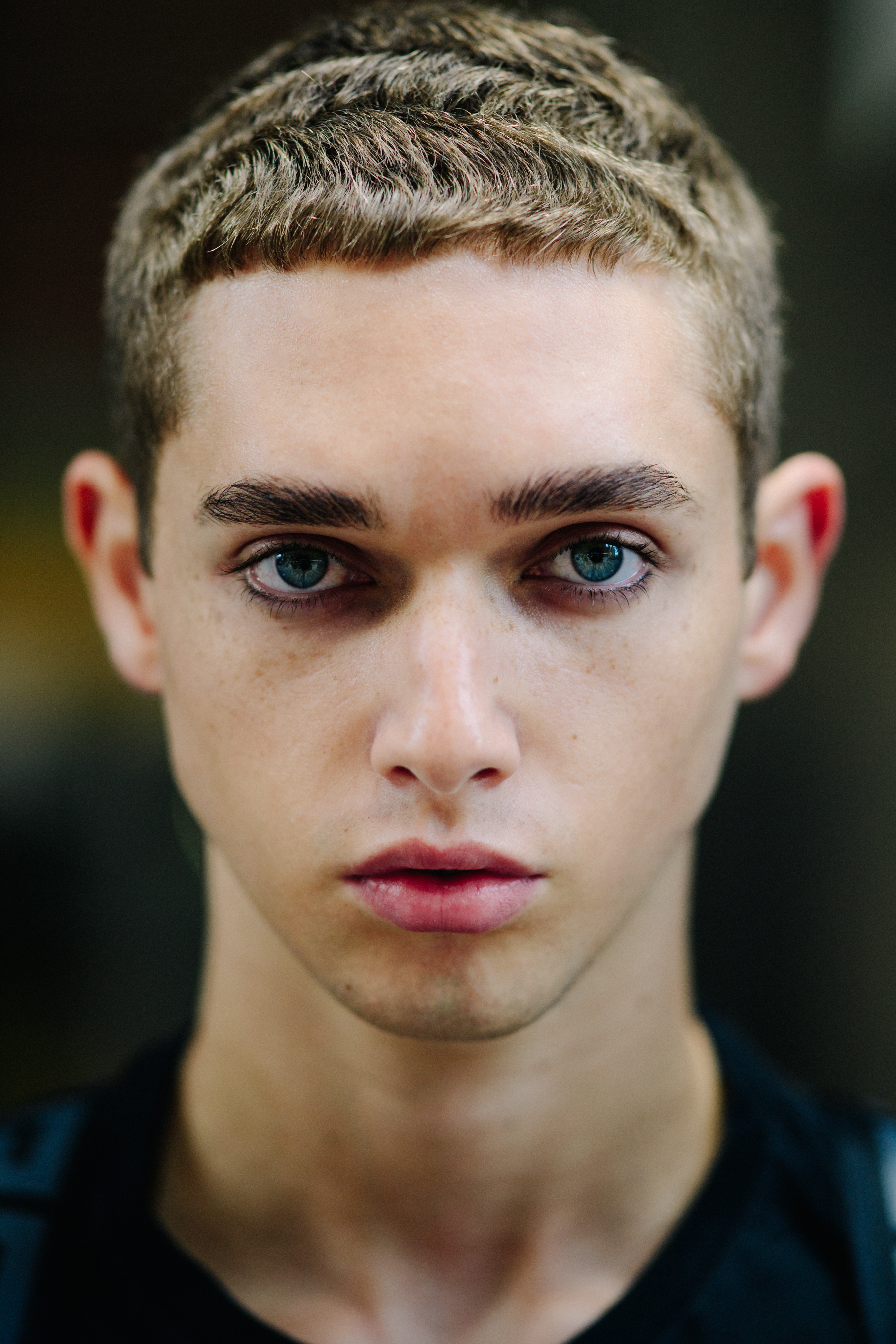 Portrait of a male model with blue eyes