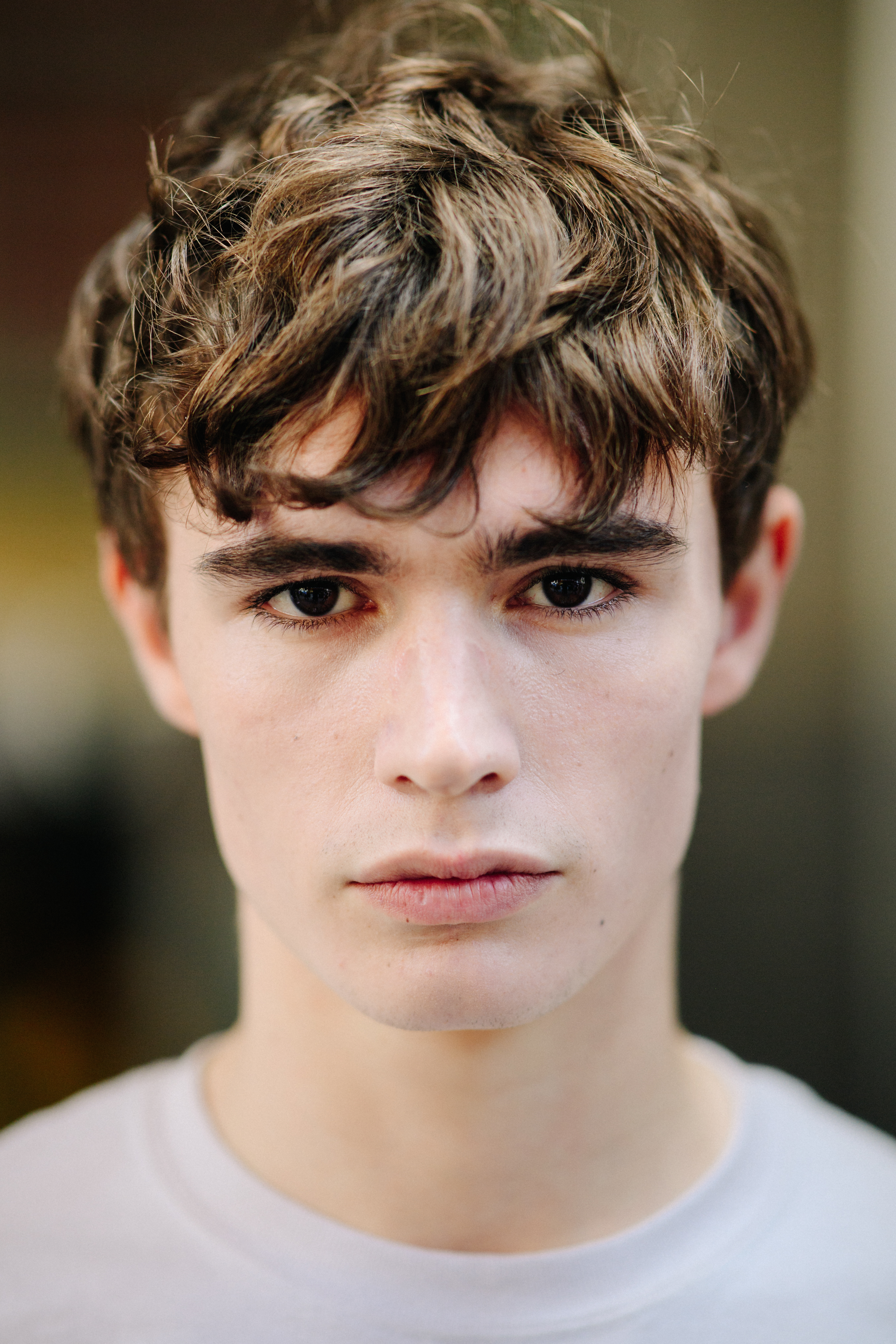 Portrait of a male model after a show