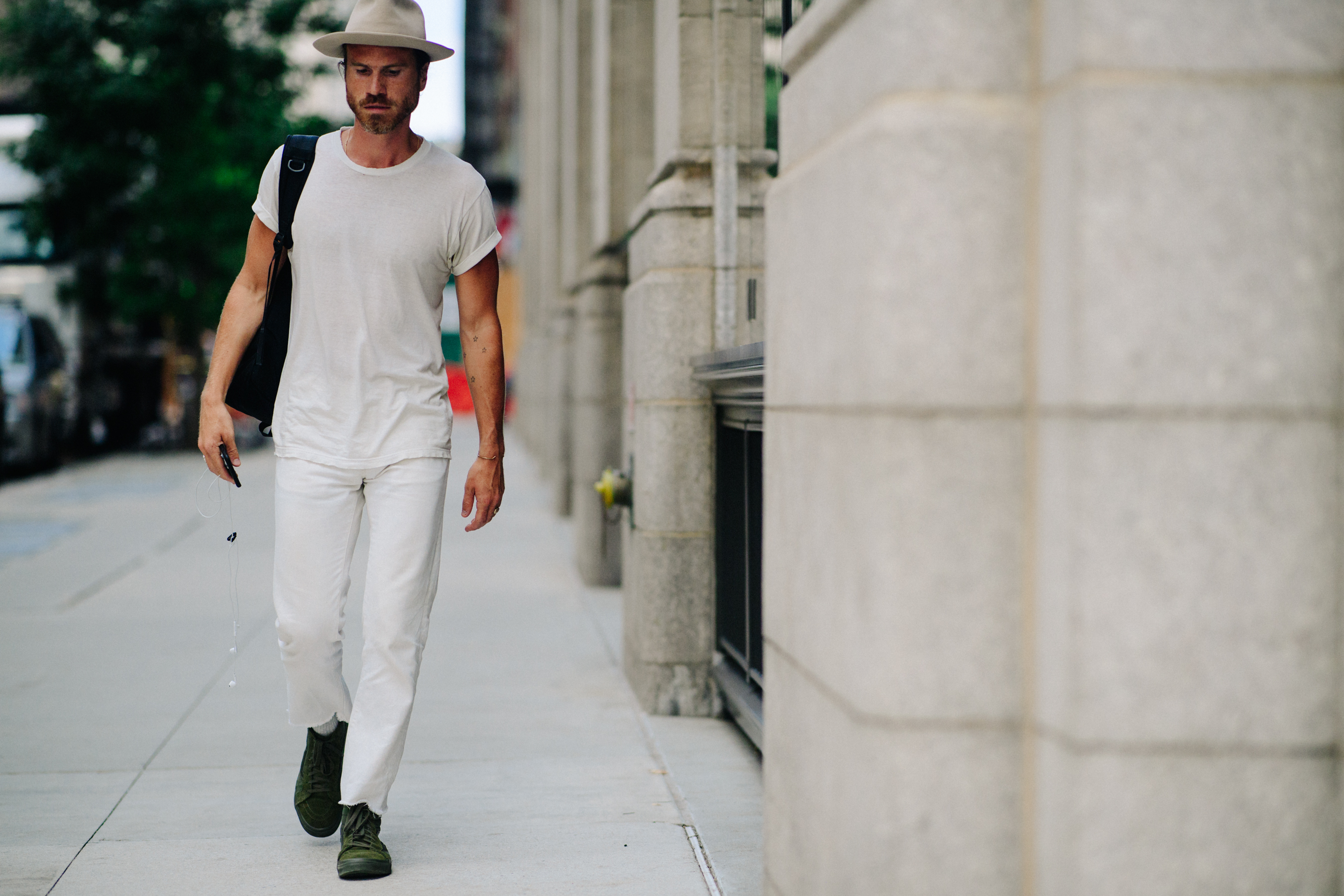 Man wearing all white and hat