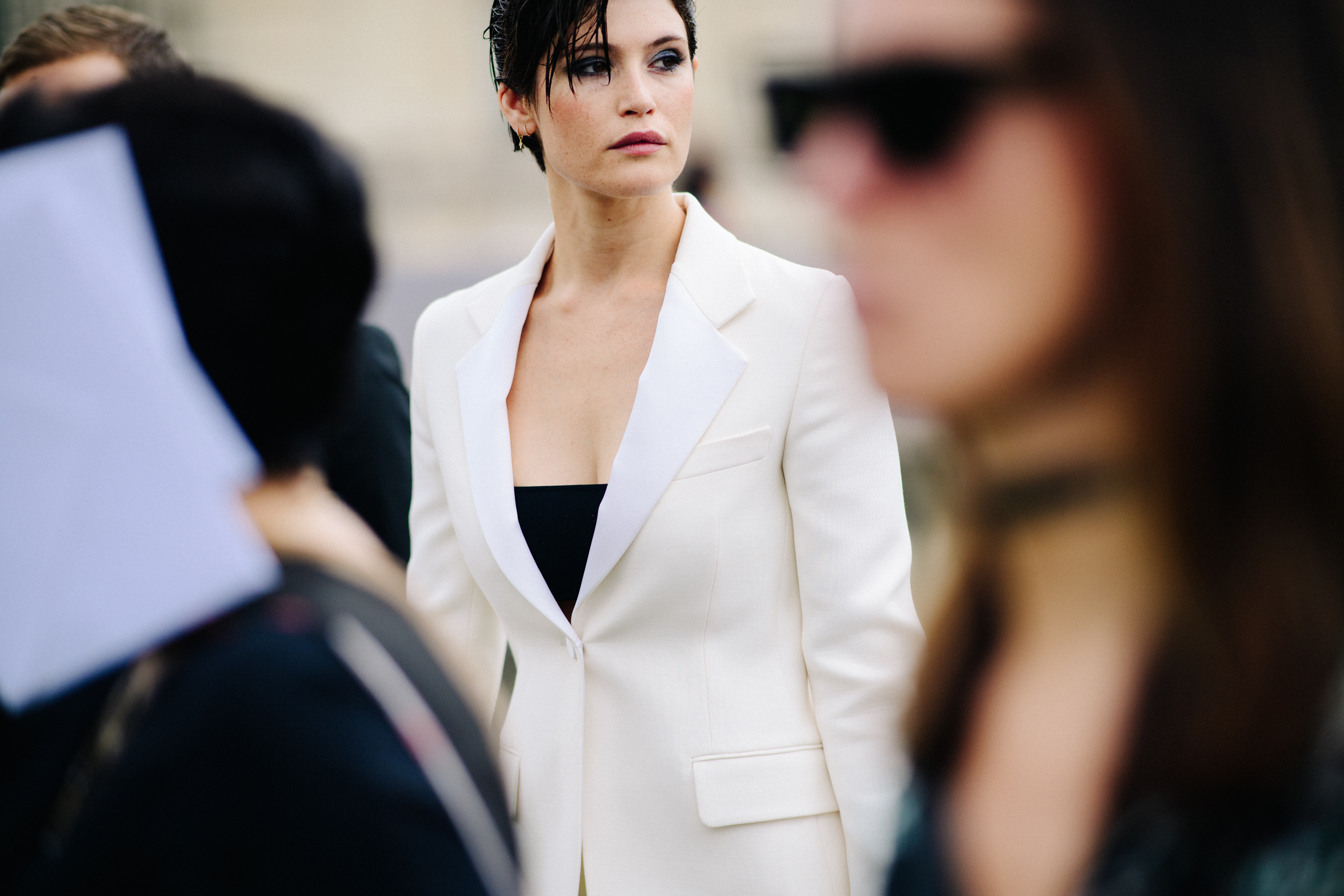 Woman wearing white blazer