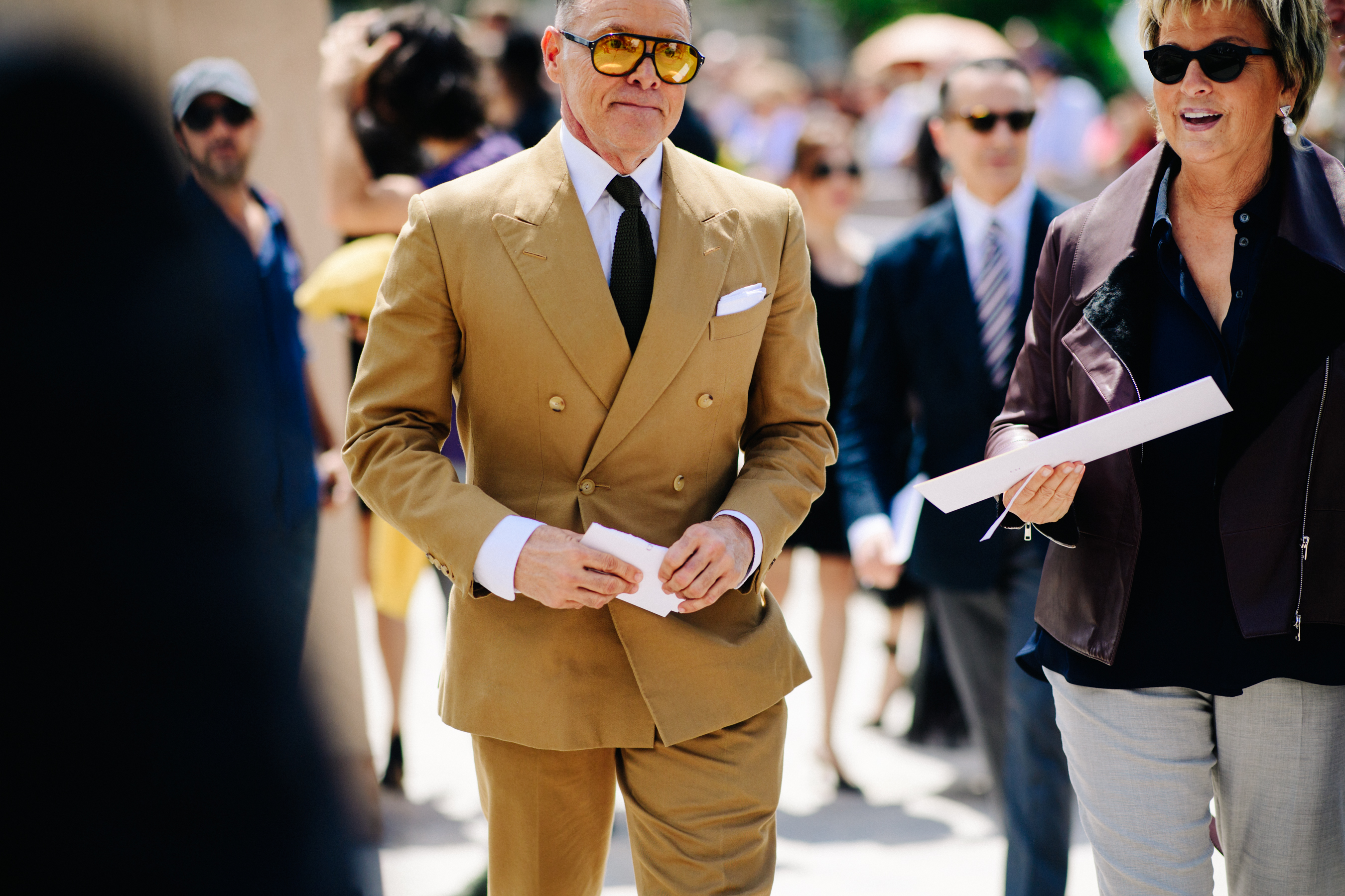 Man wearing mustard colour jacket