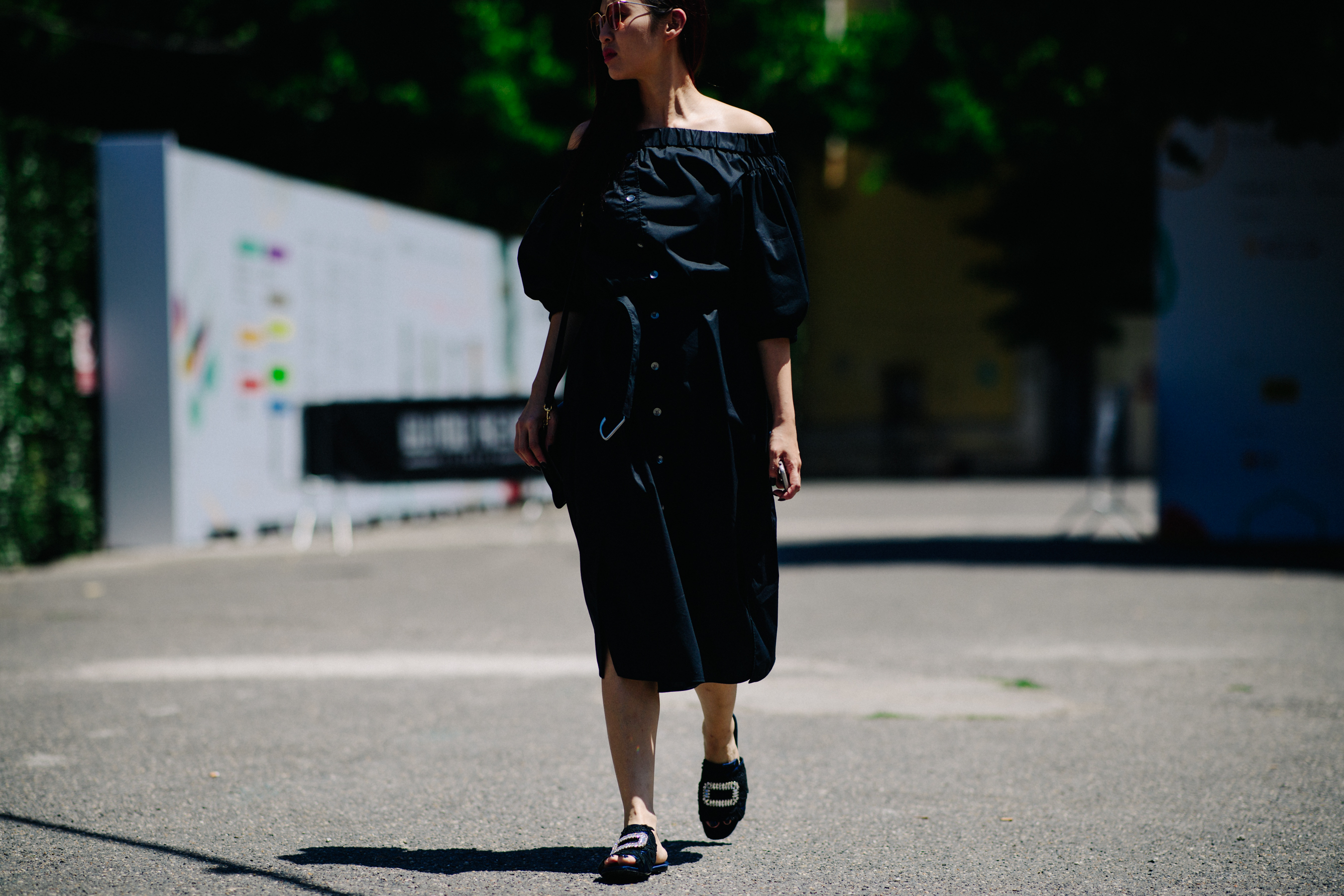 Woman wearing a large black dress